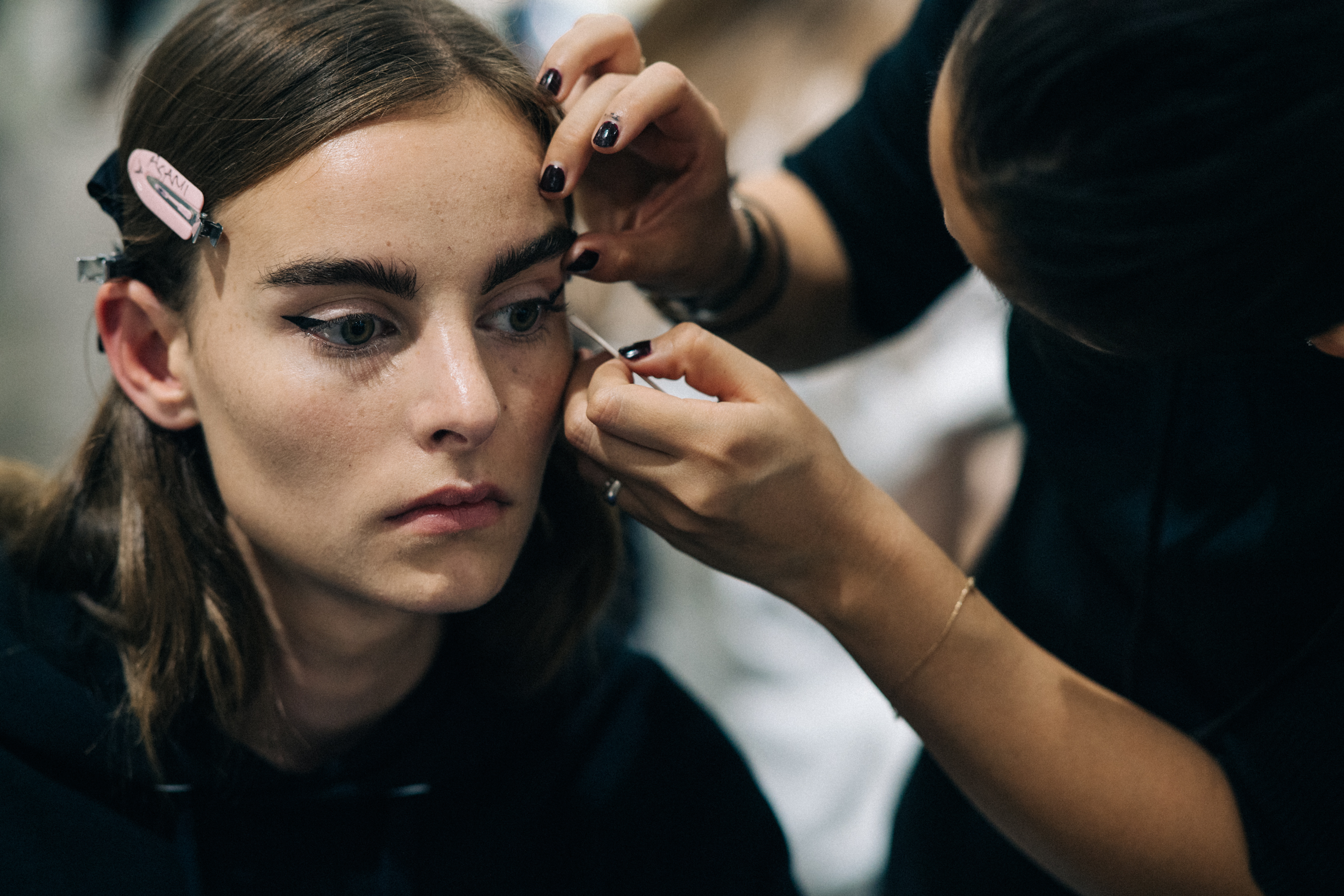 Model getting hair and make up done