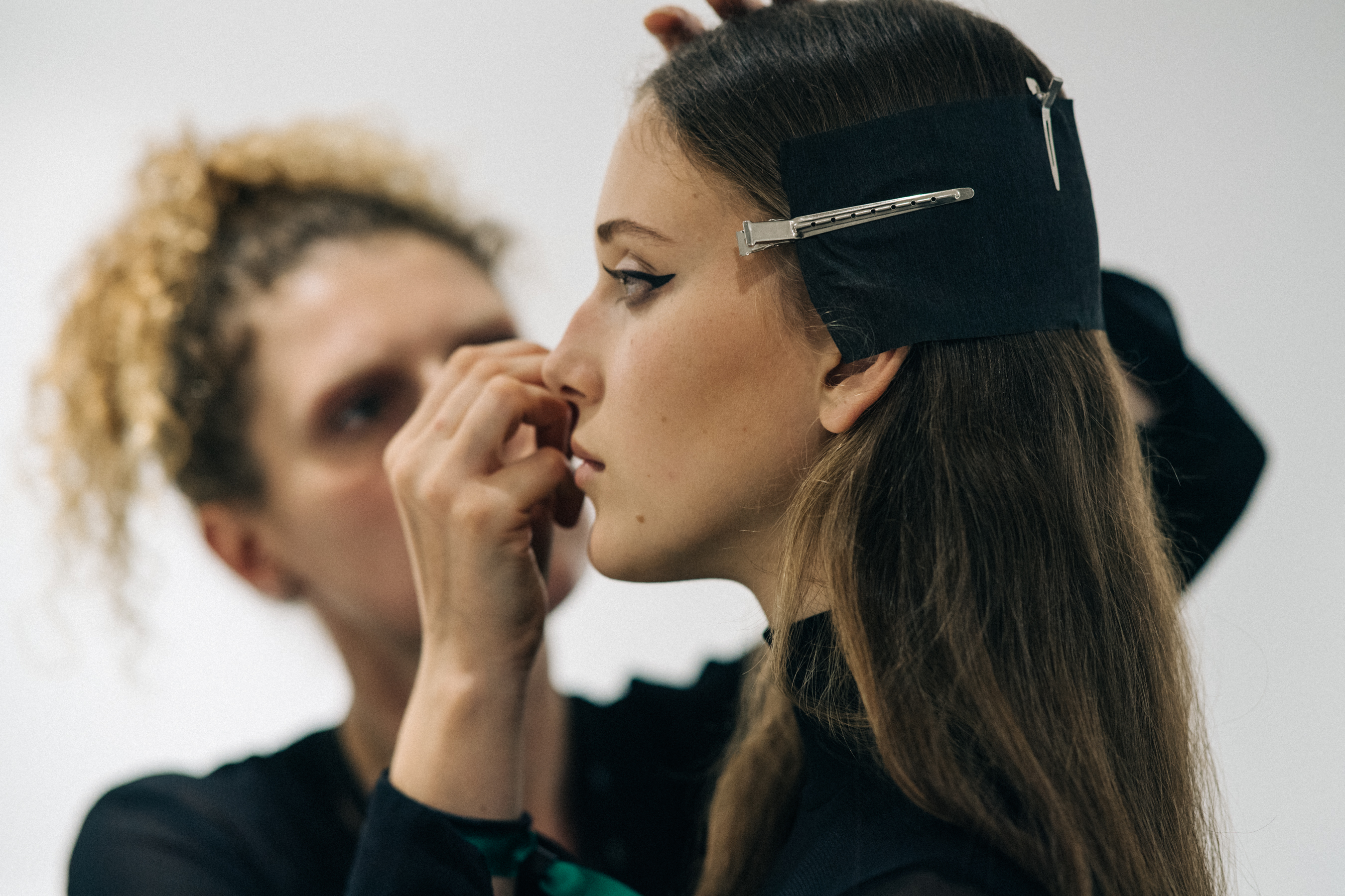 Model getting hair and make up done