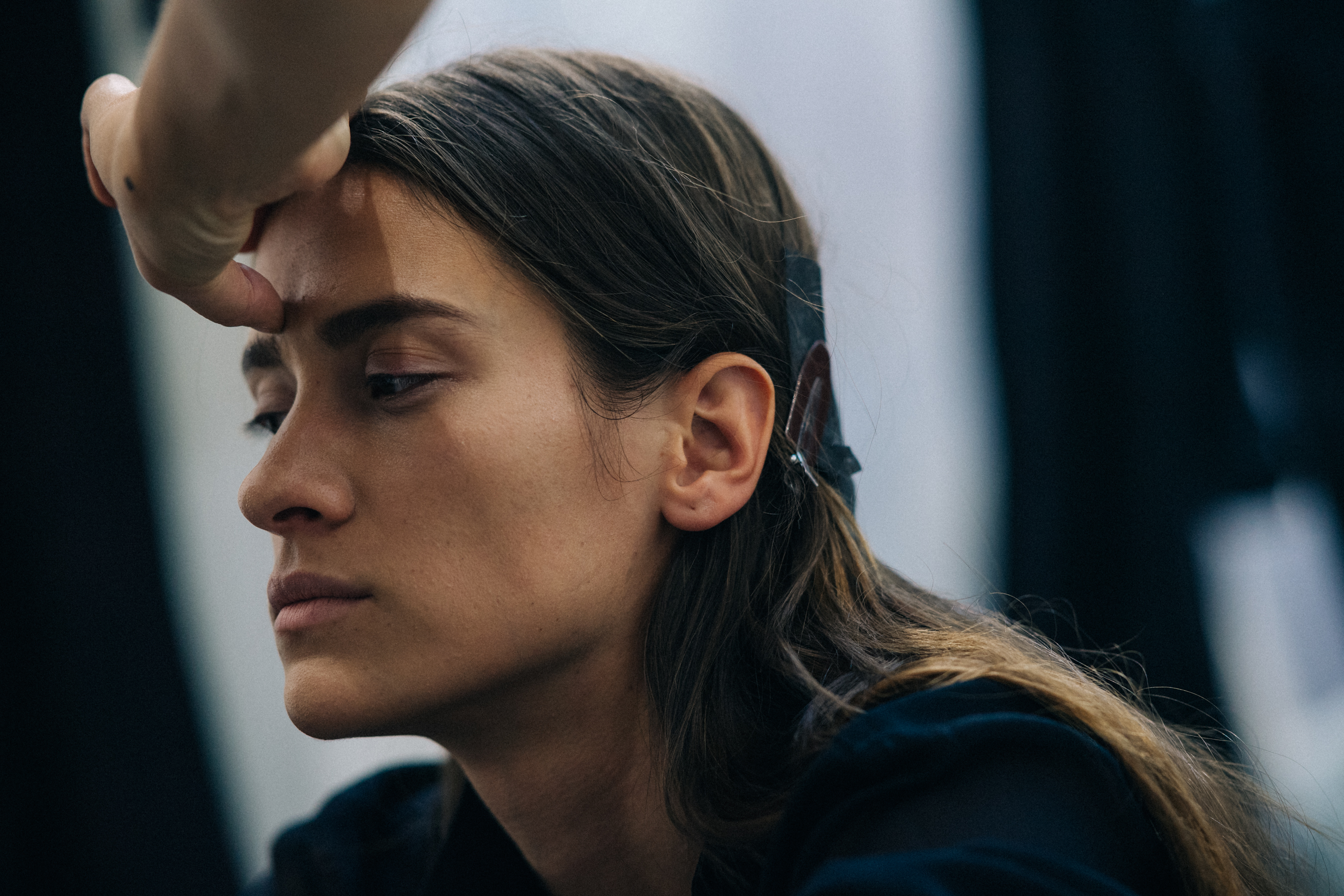 Model getting hair and make up done