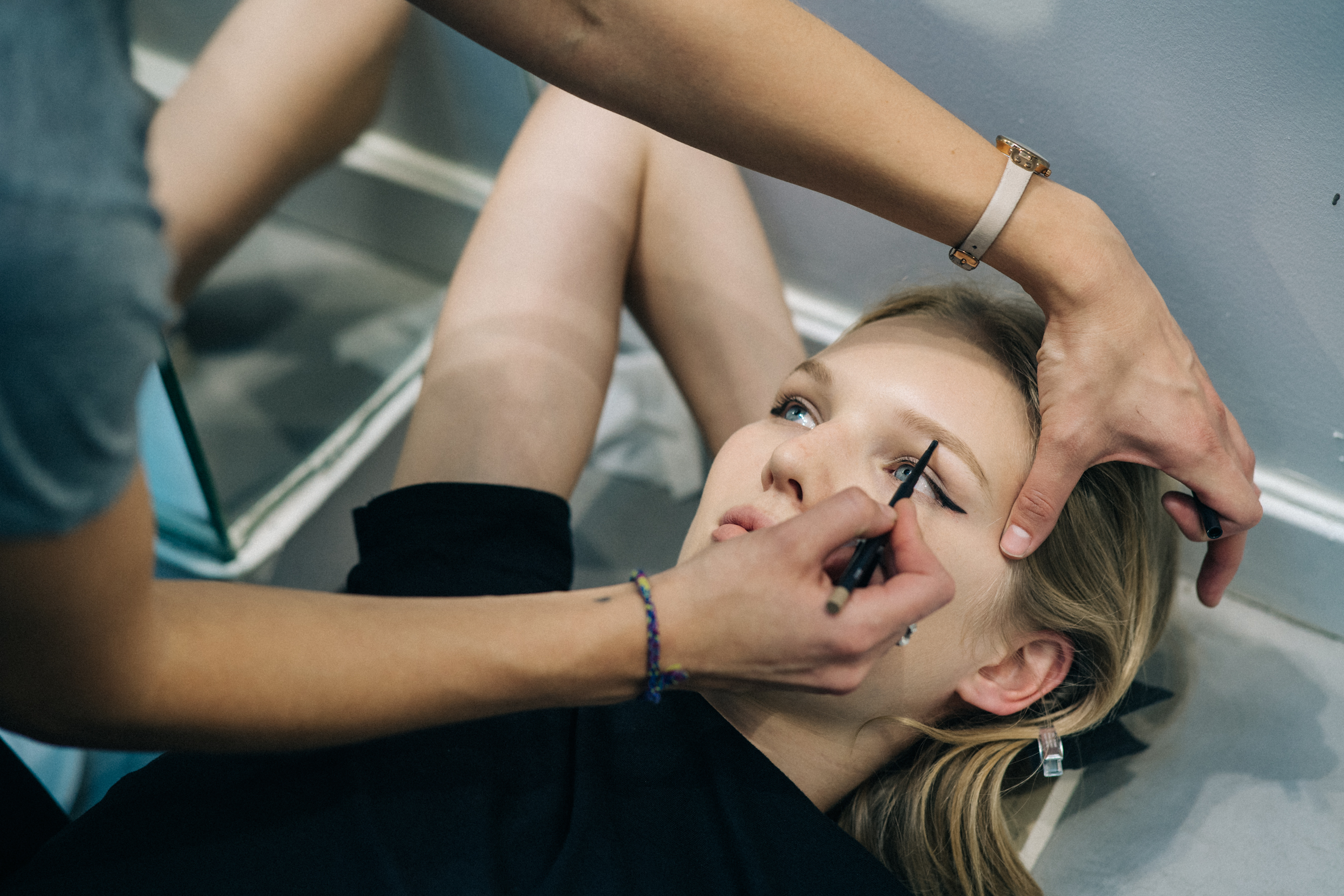 Model getting hair and make up done
