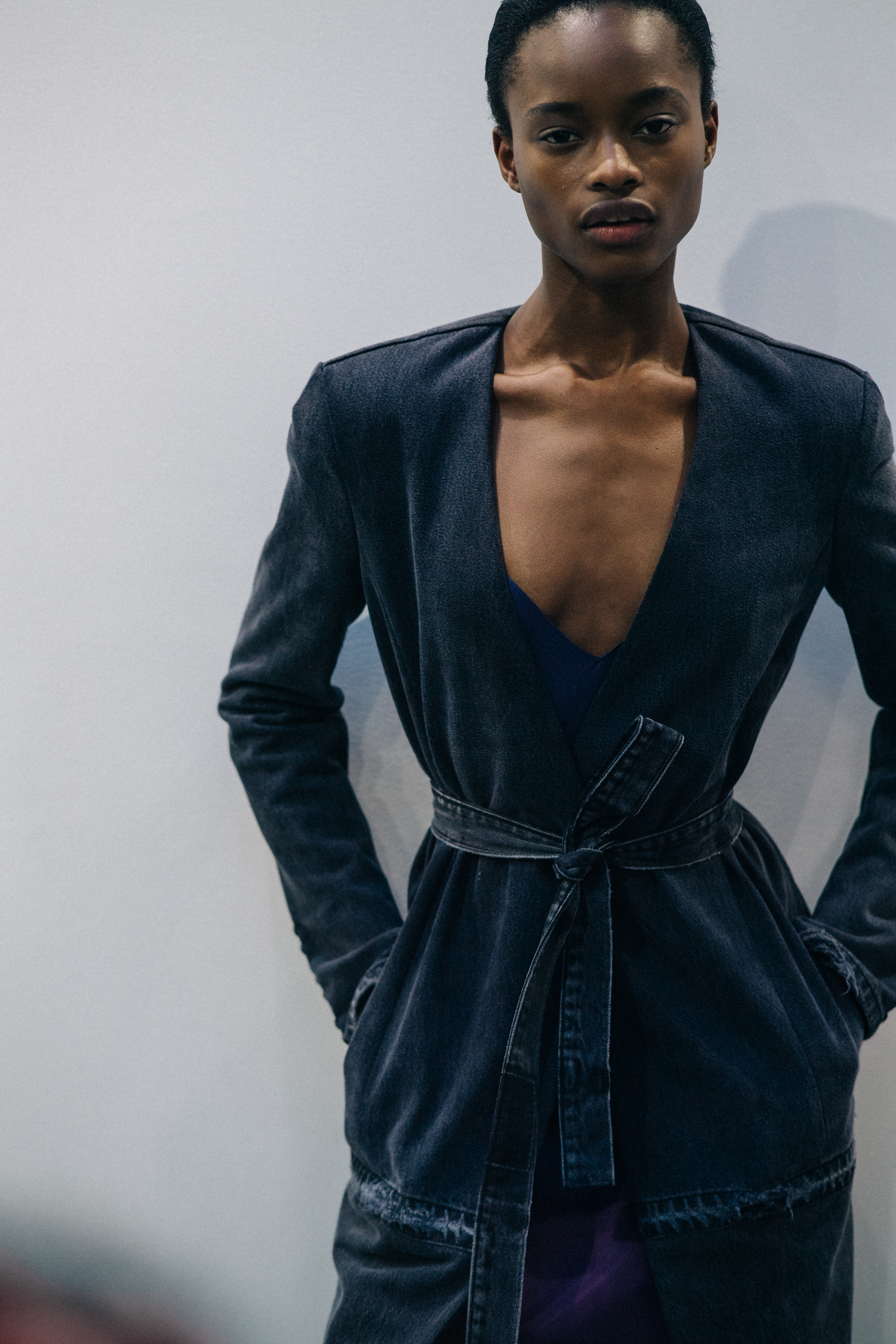 Model wearing blue dress