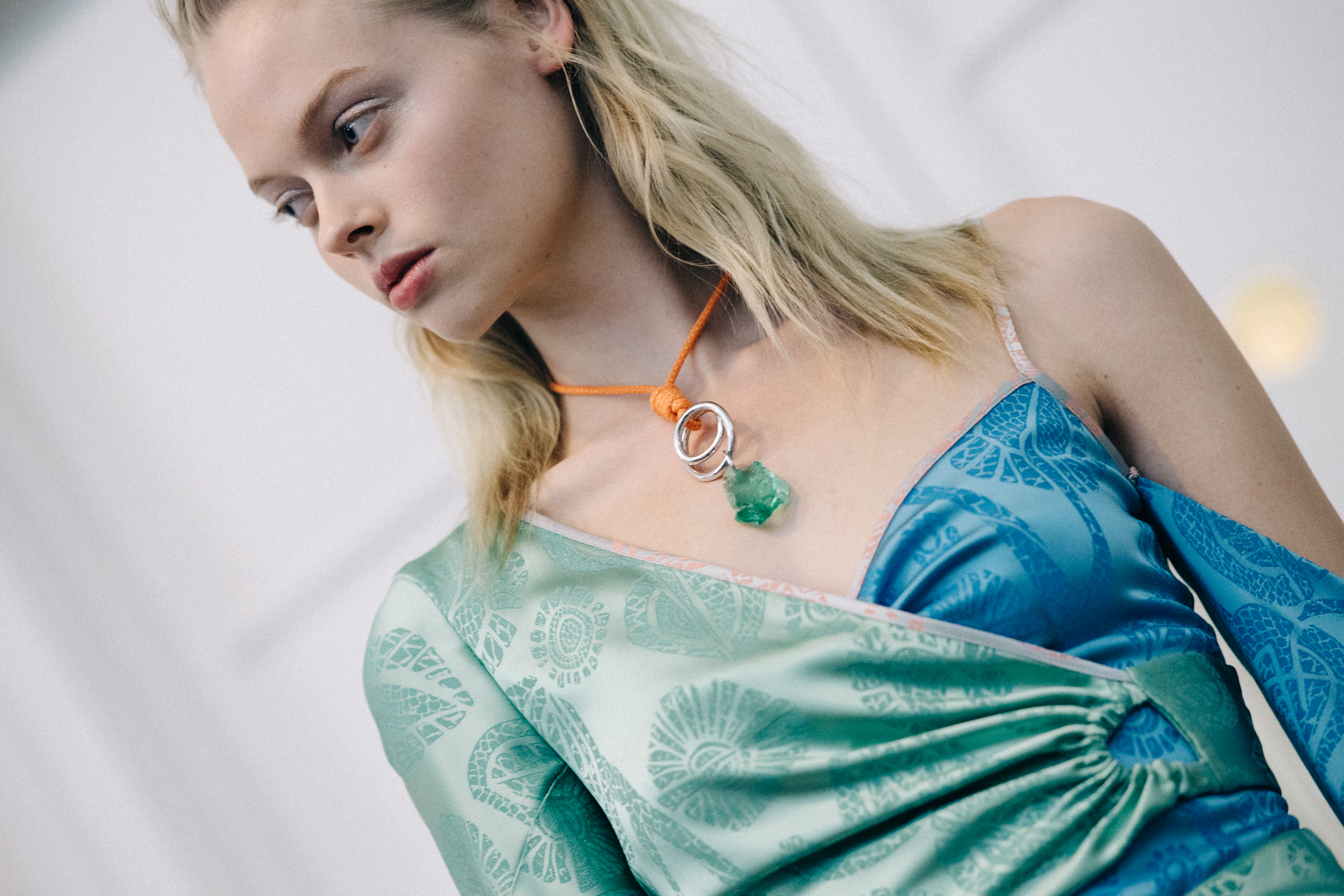 Model wearing green dress