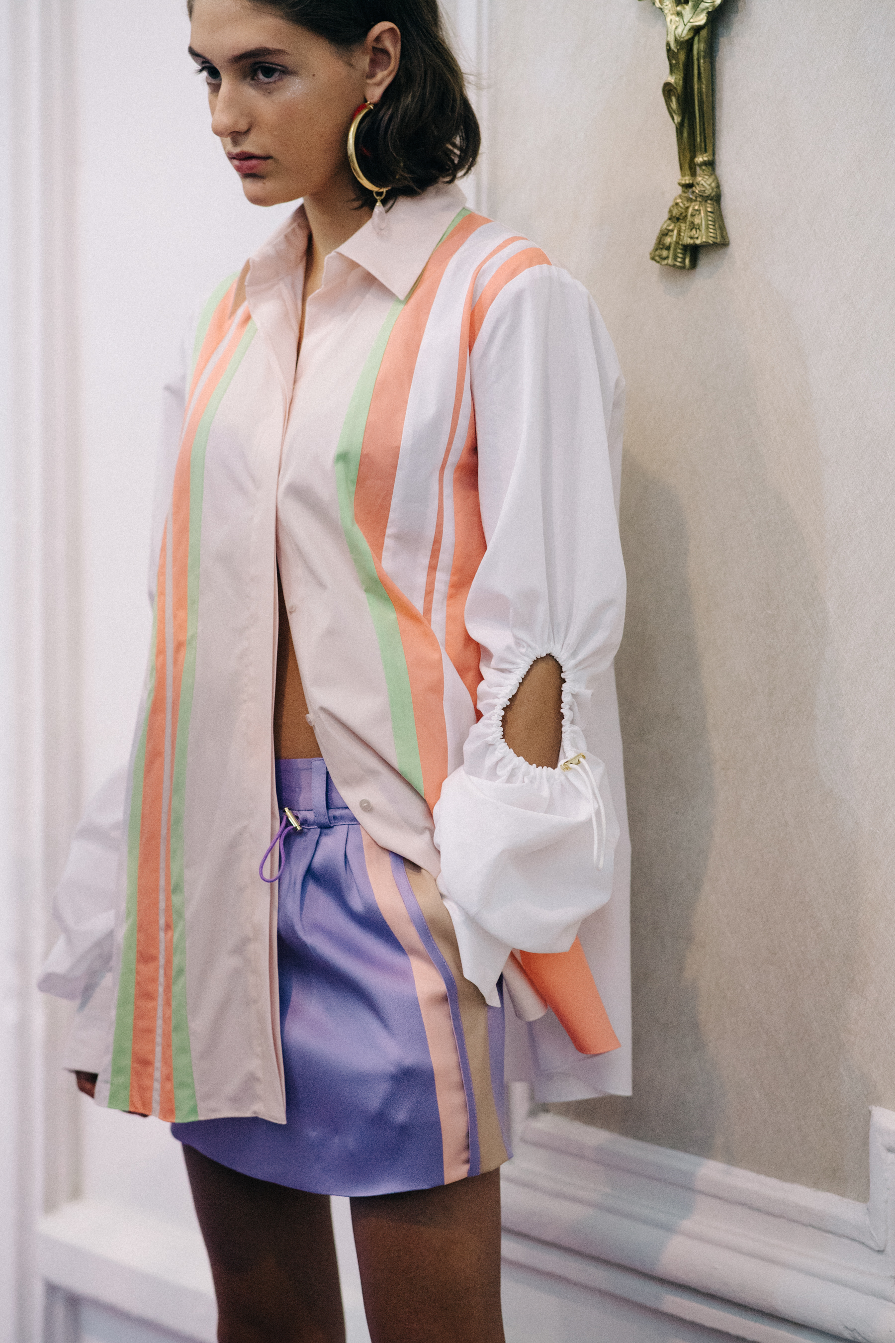 Model wearing white shirt