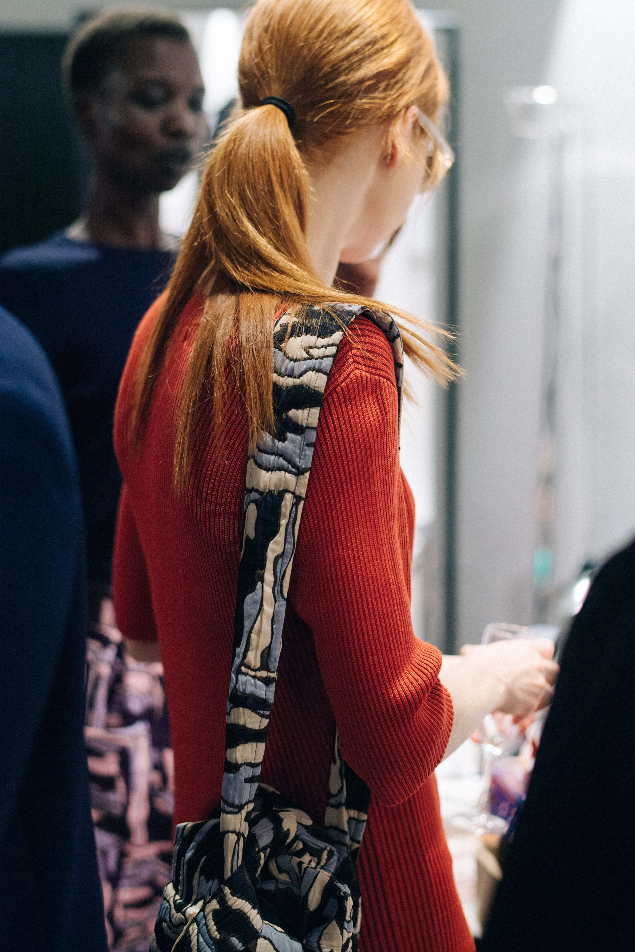 Model wearing colourful printed outfits