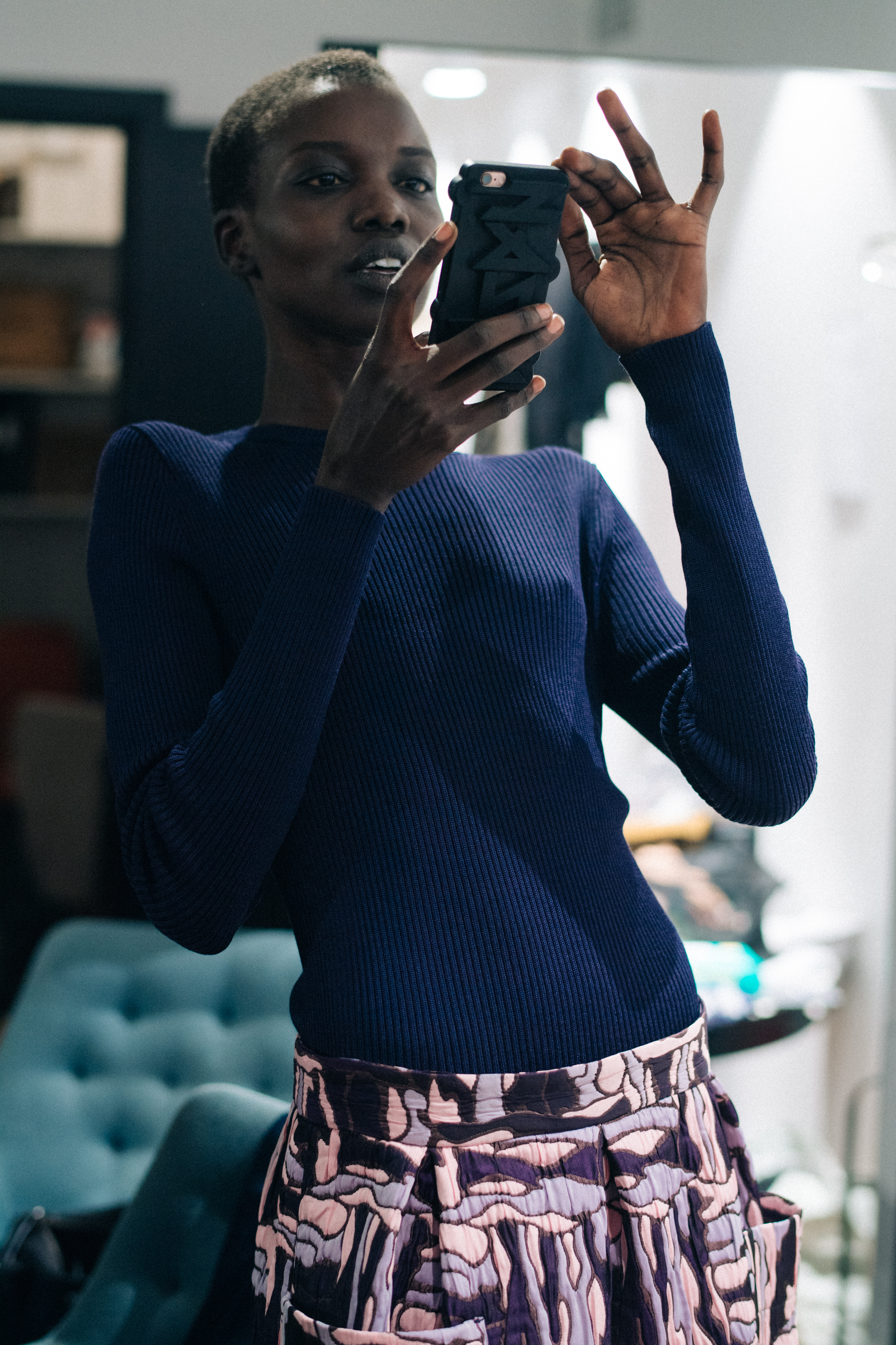 Model wearig blue sweater