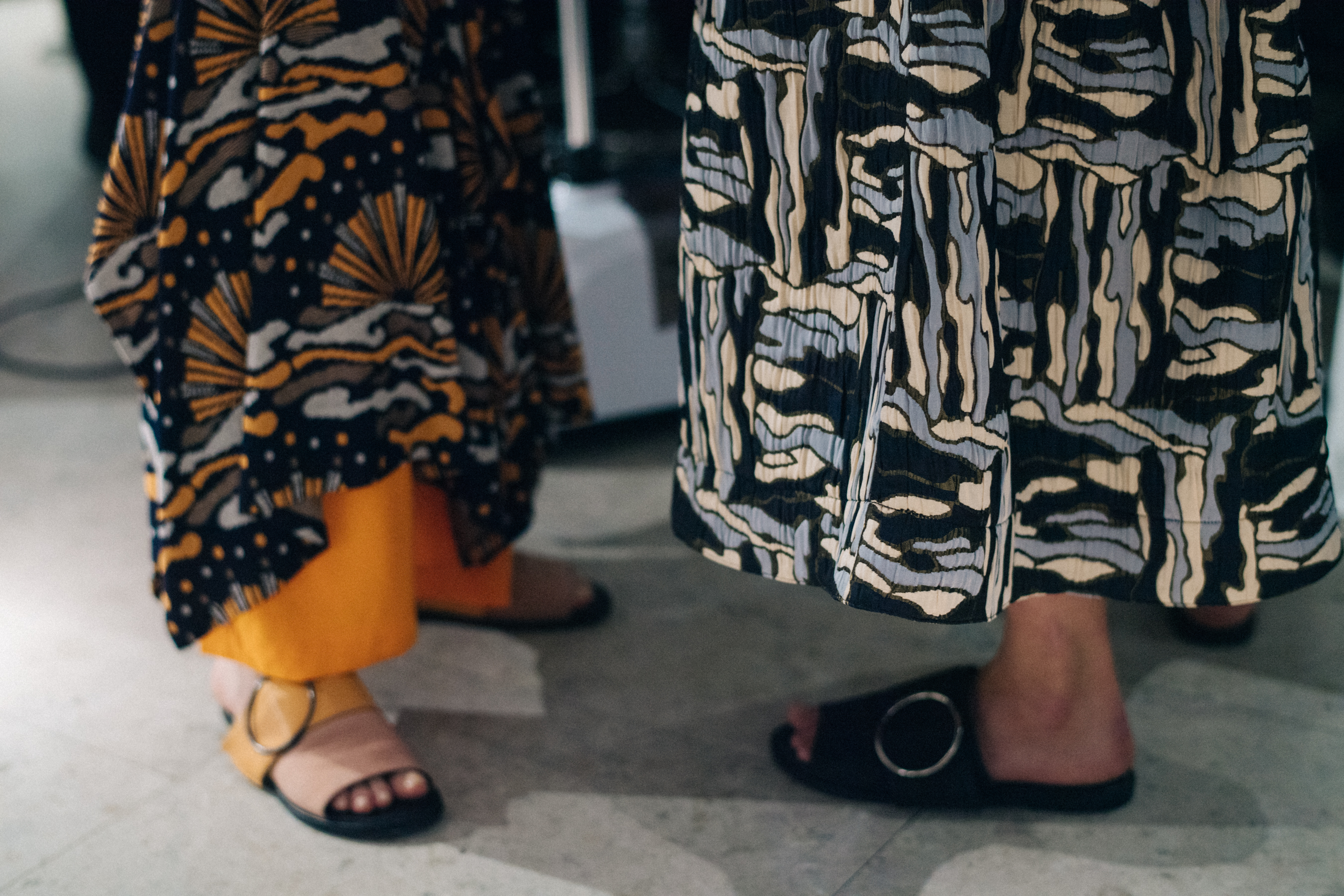 Model wearing colourful printed outfits