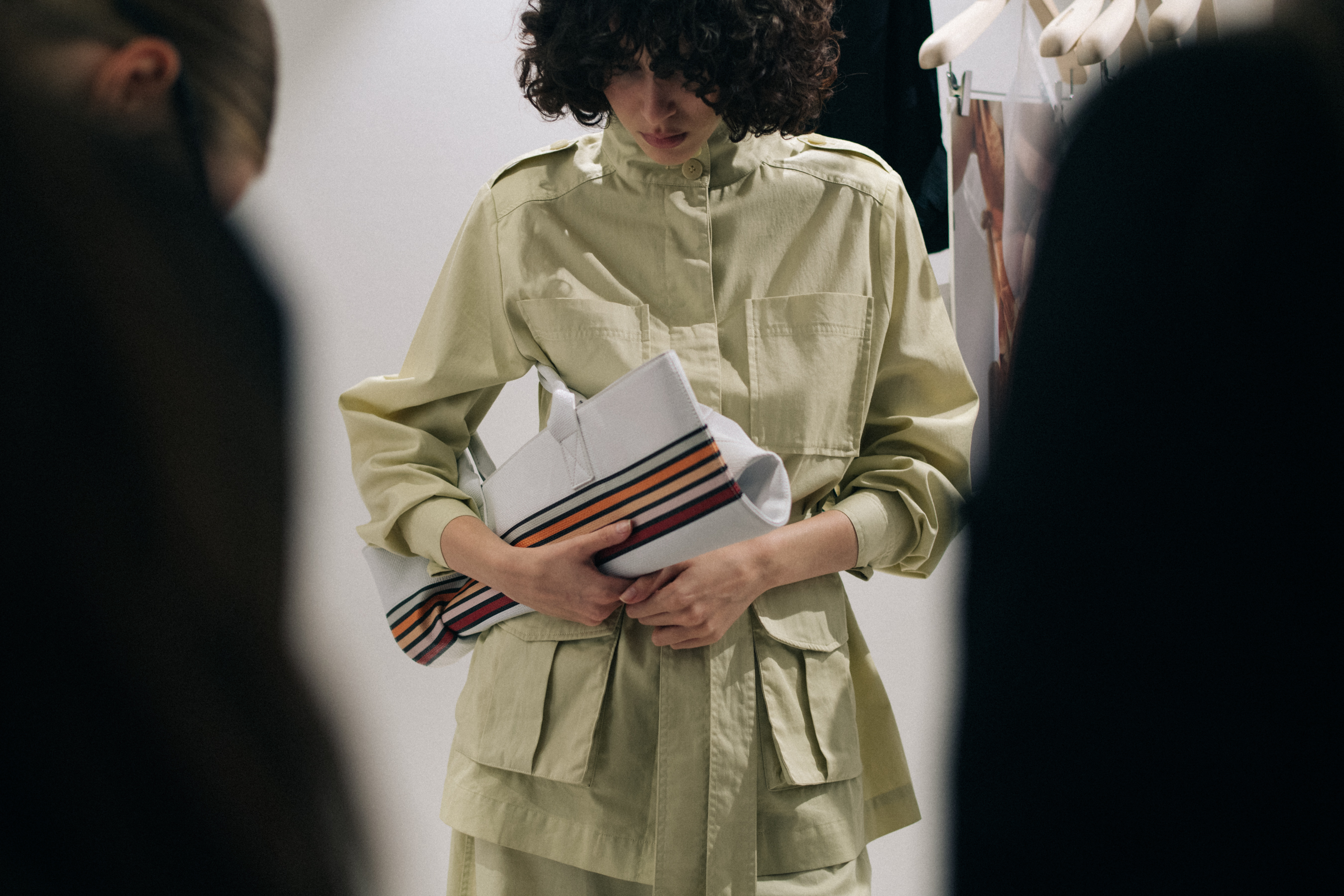 Model wearing beige work wear