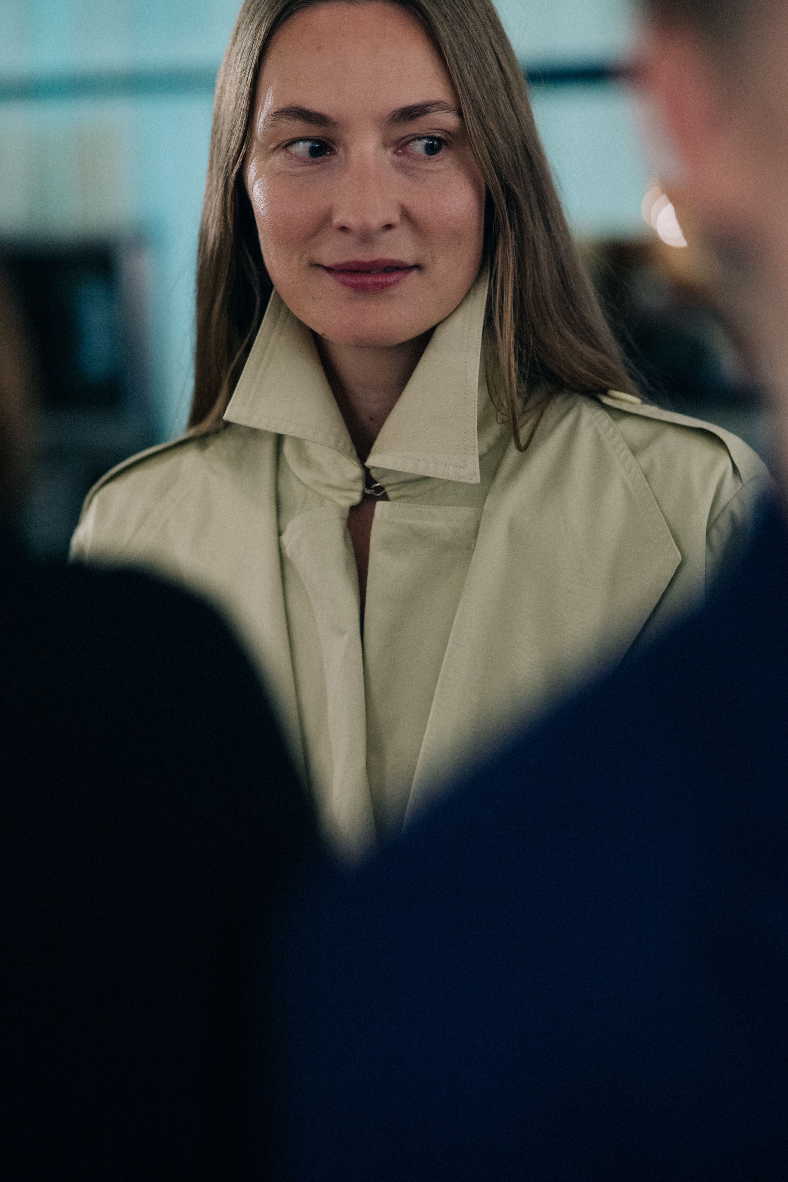 Model wearing beige coat