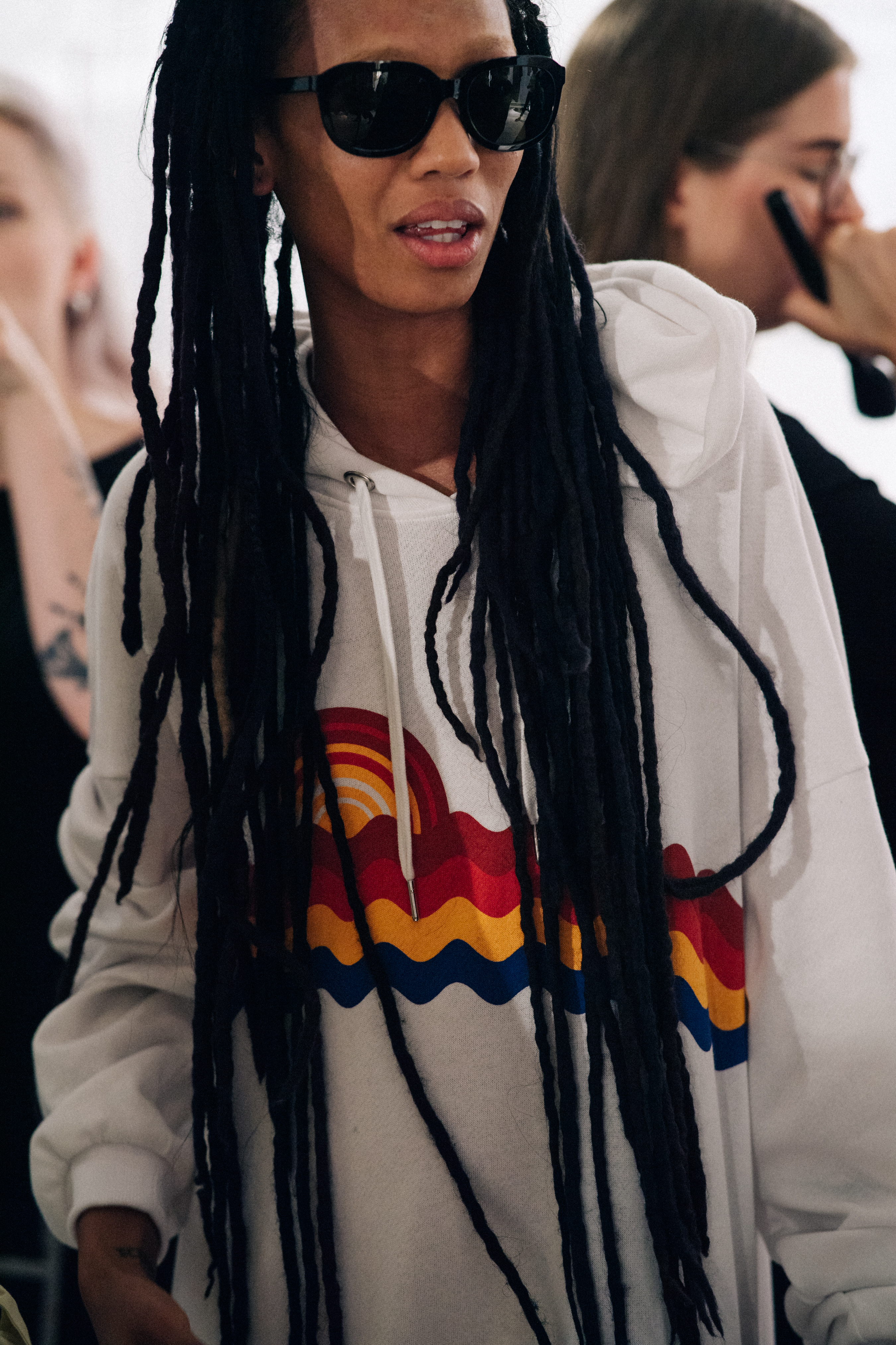 Woman with long black dreadlocks