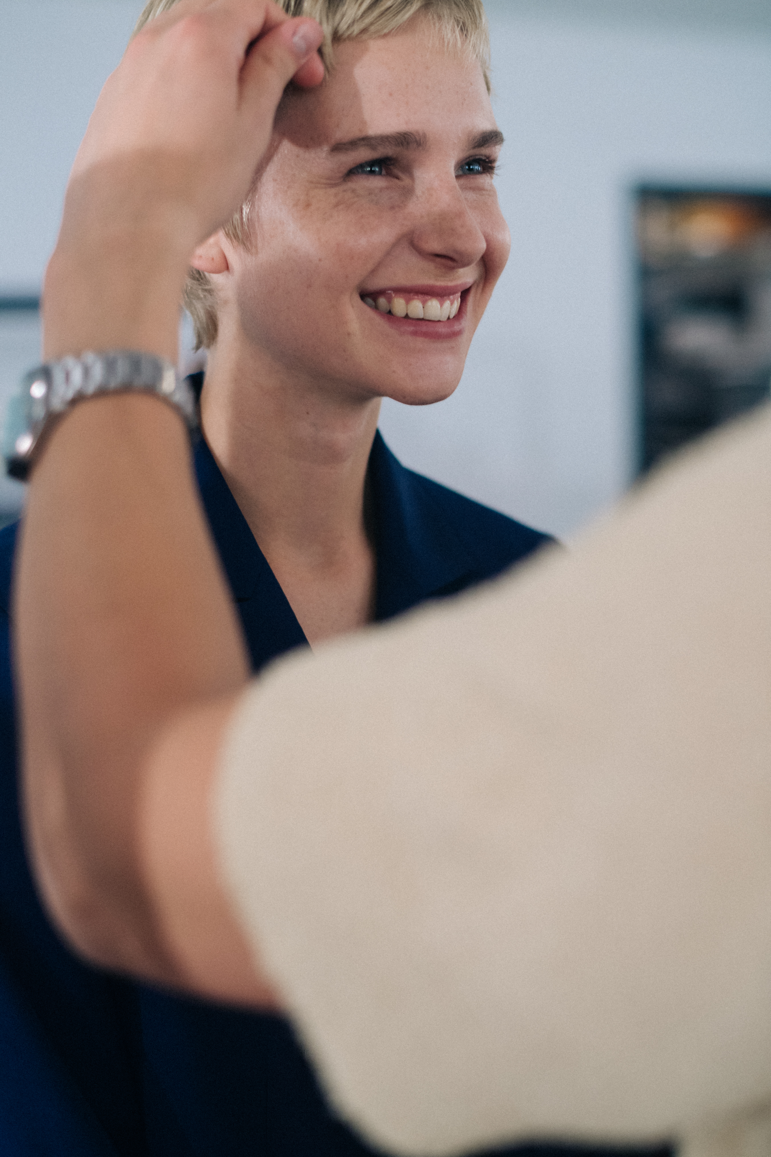 Model wearing blue before a show