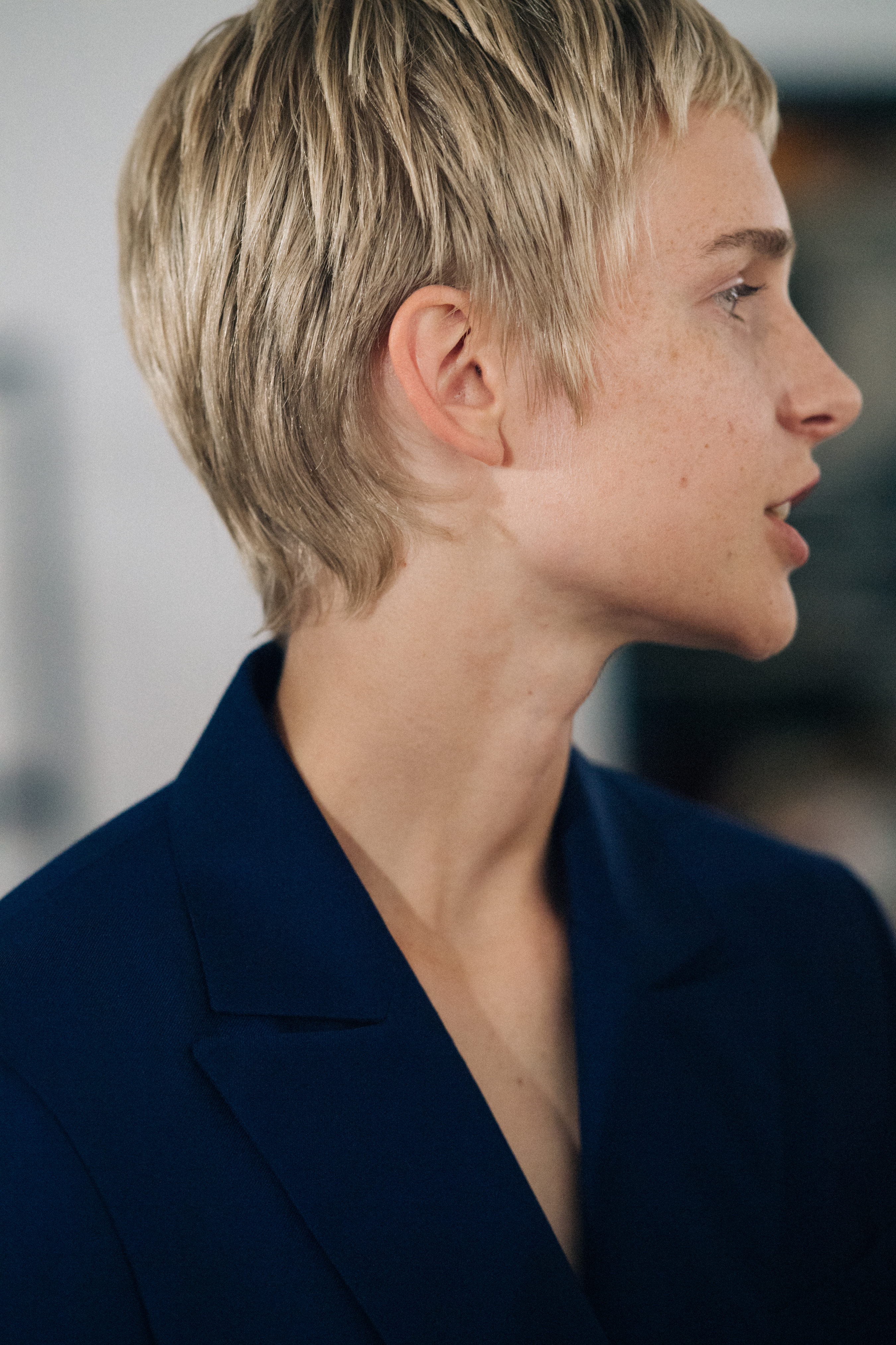 Model wearing blue before a show
