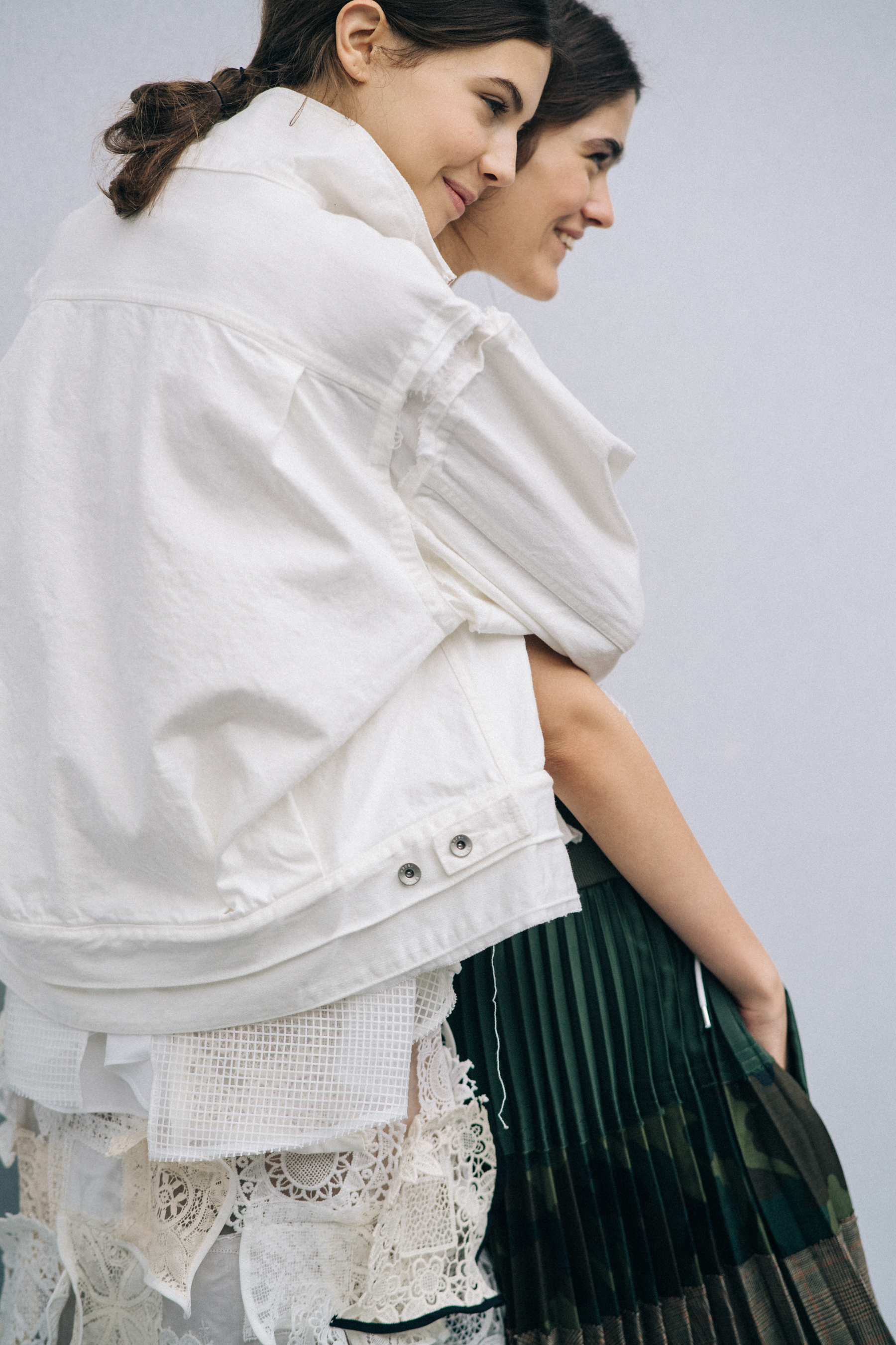 Model wearing white outfit