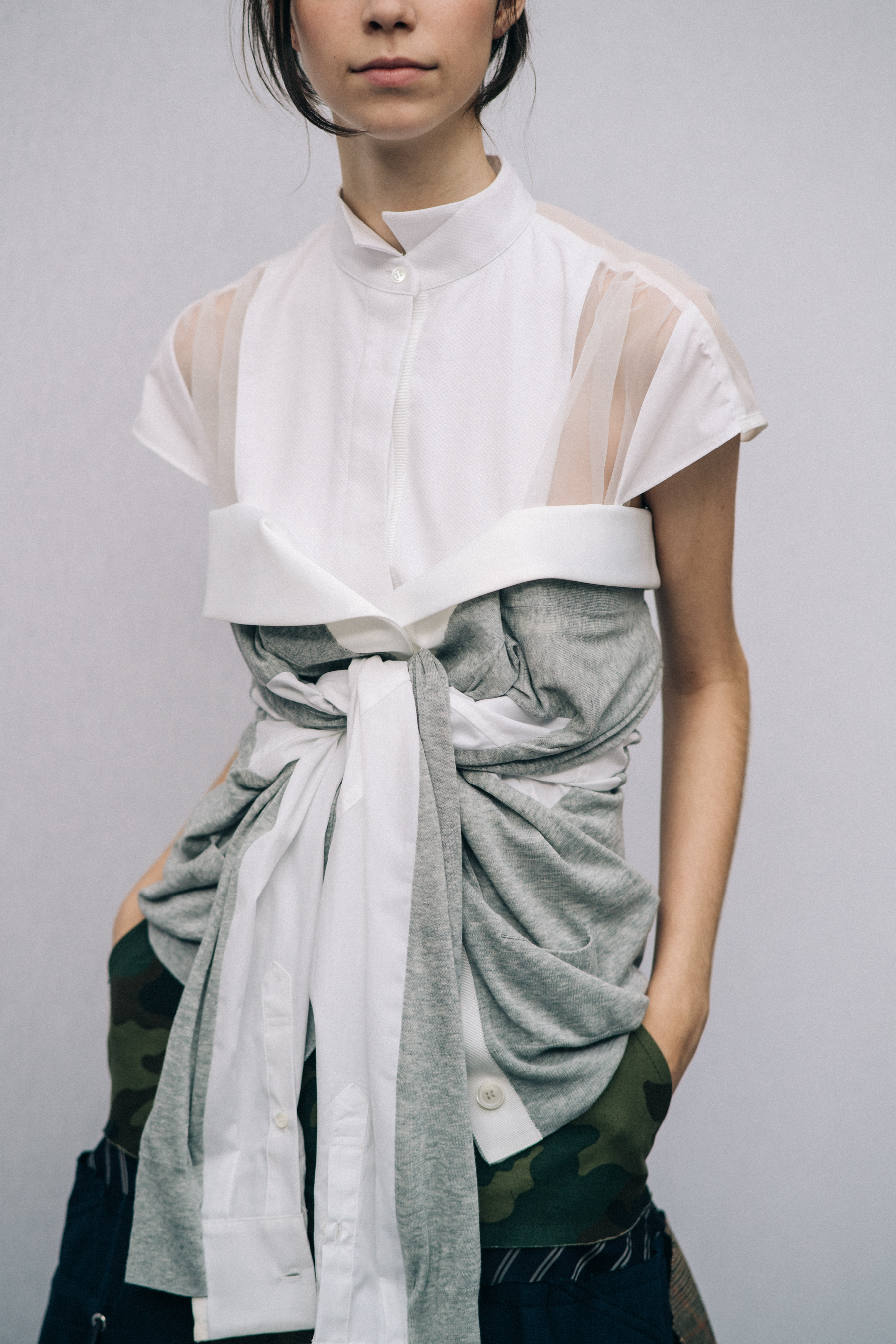 Model wearing white outfit
