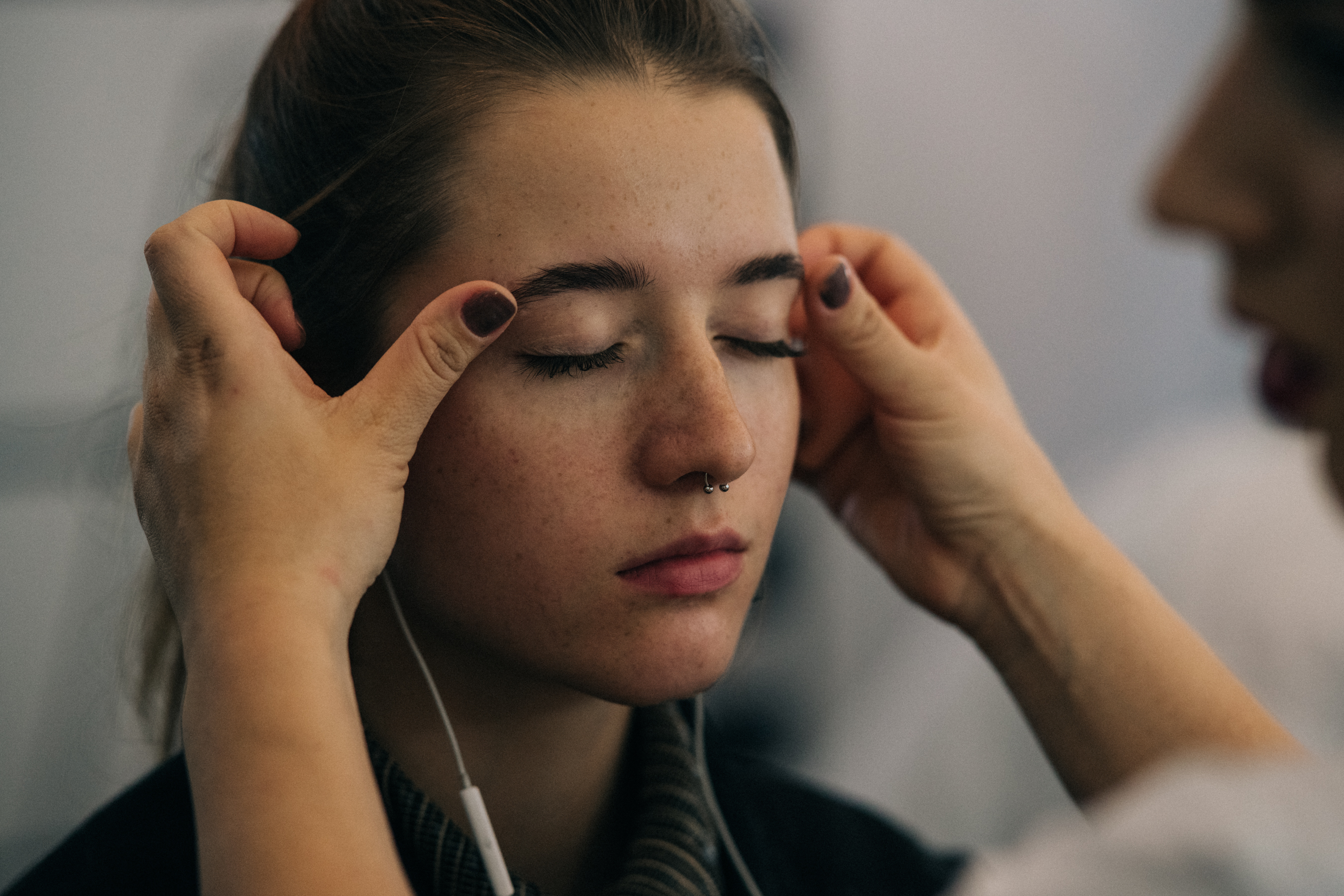 Model having makeup applied