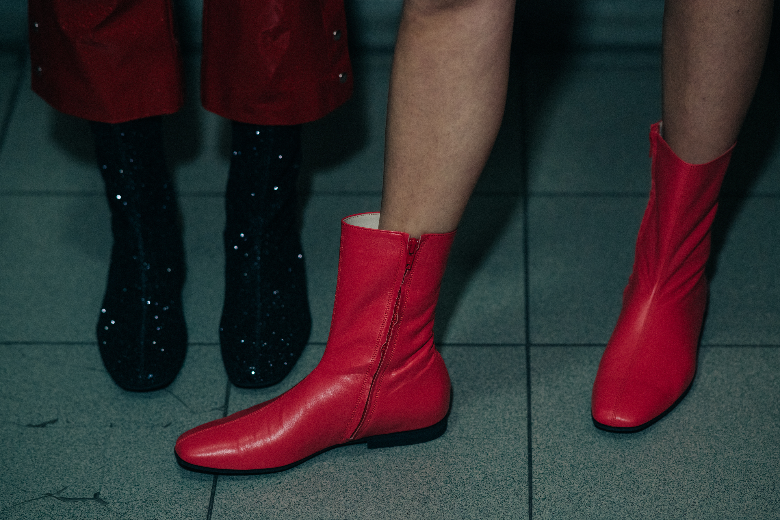 Red and black boots backstage