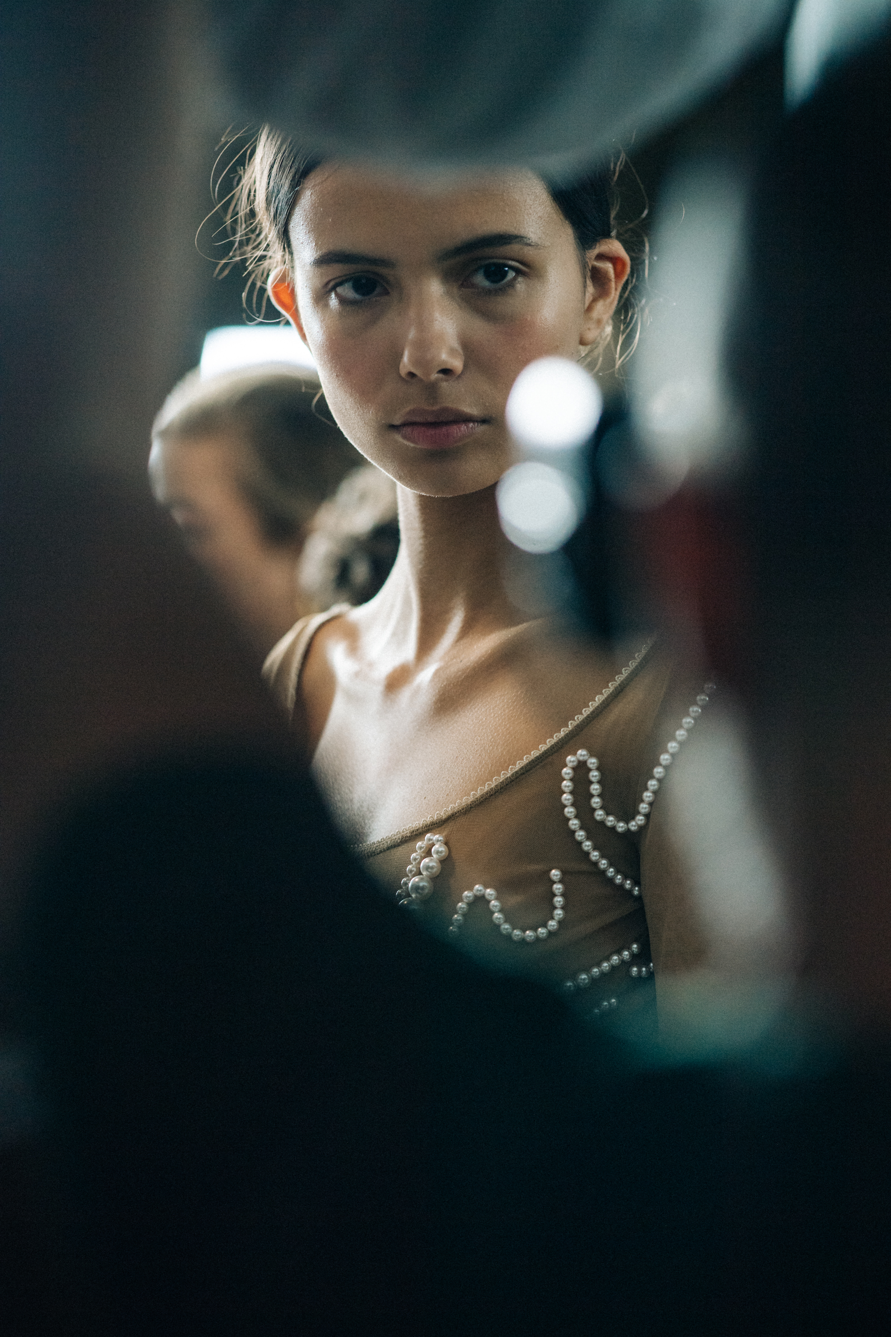 Model getting hair and make up done