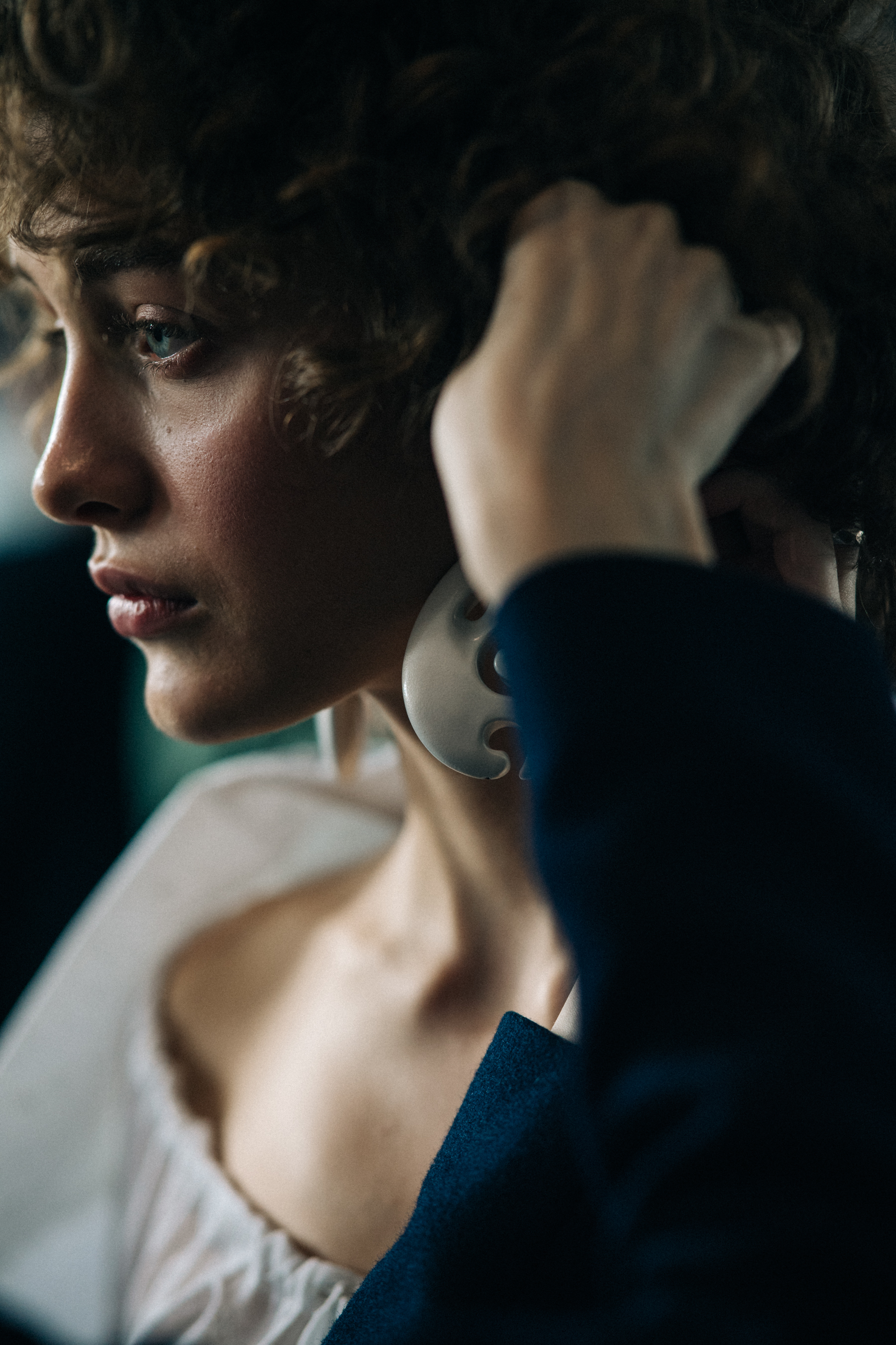 Model getting hair and make up done