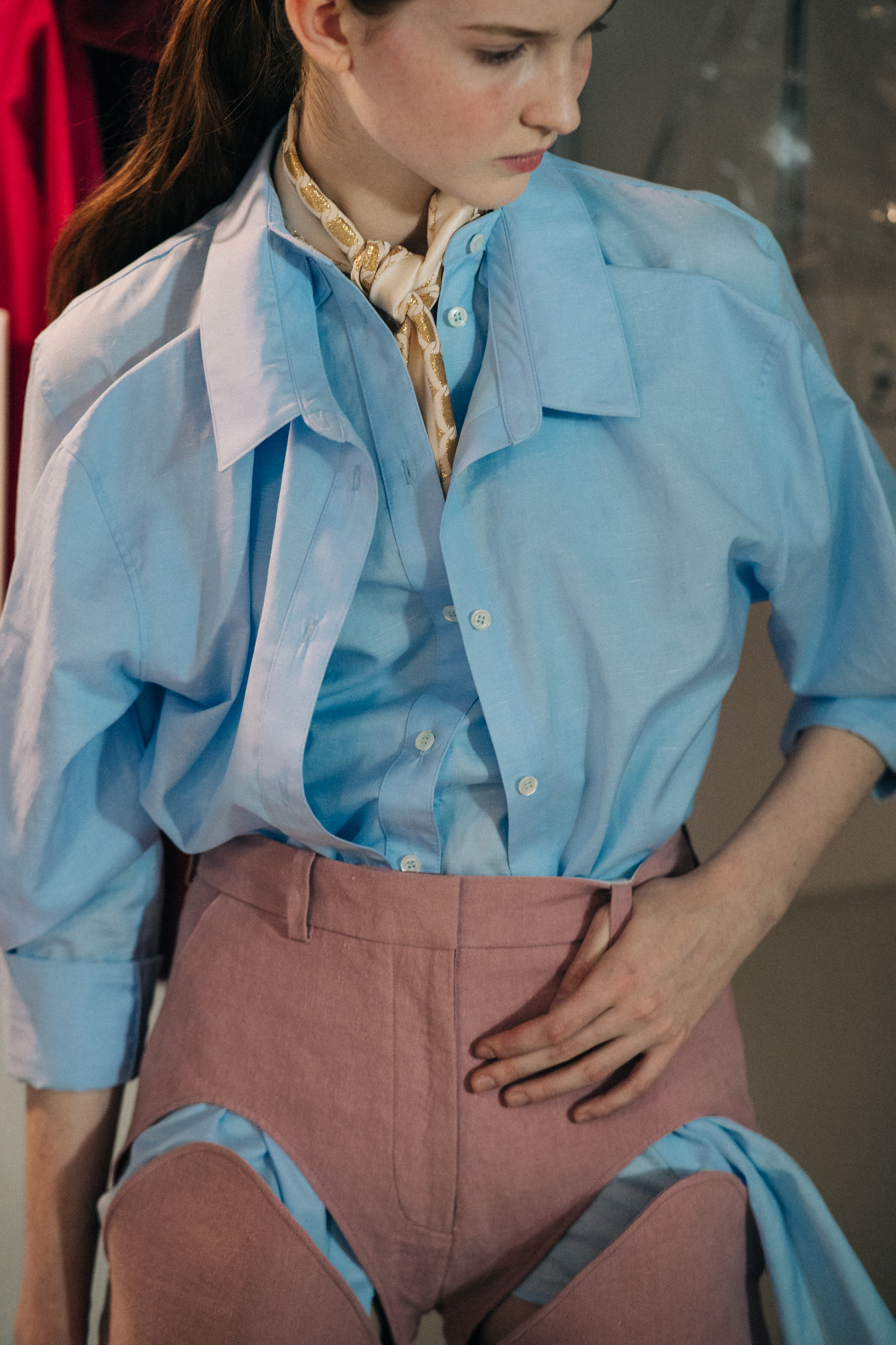 Model wearing pink conceptual jeans