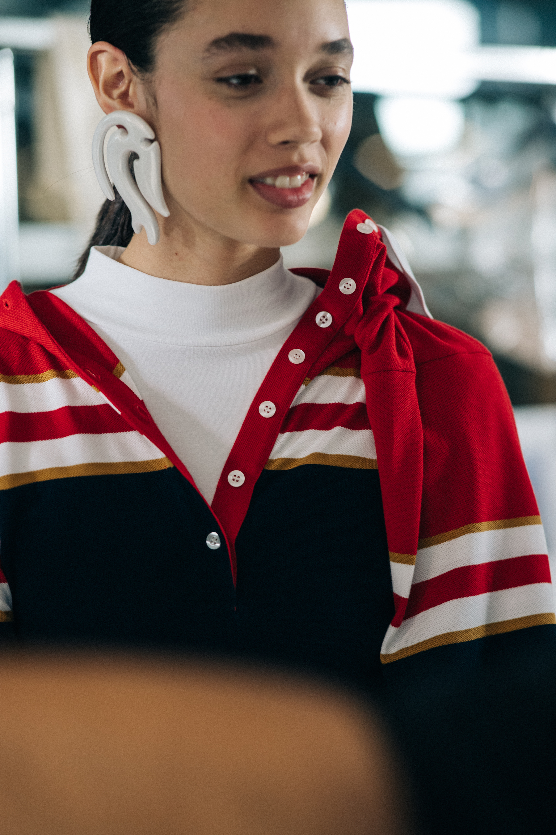 Model wearing red outfit