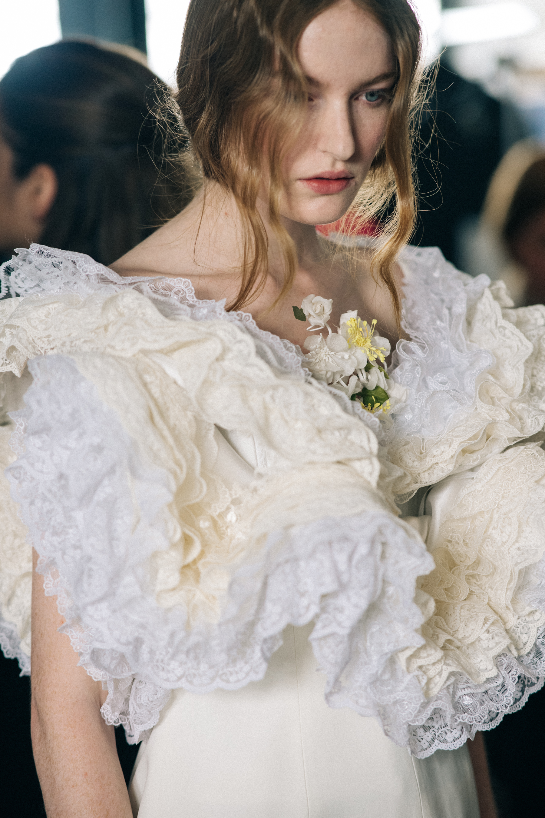 Model wearing ruffled dress