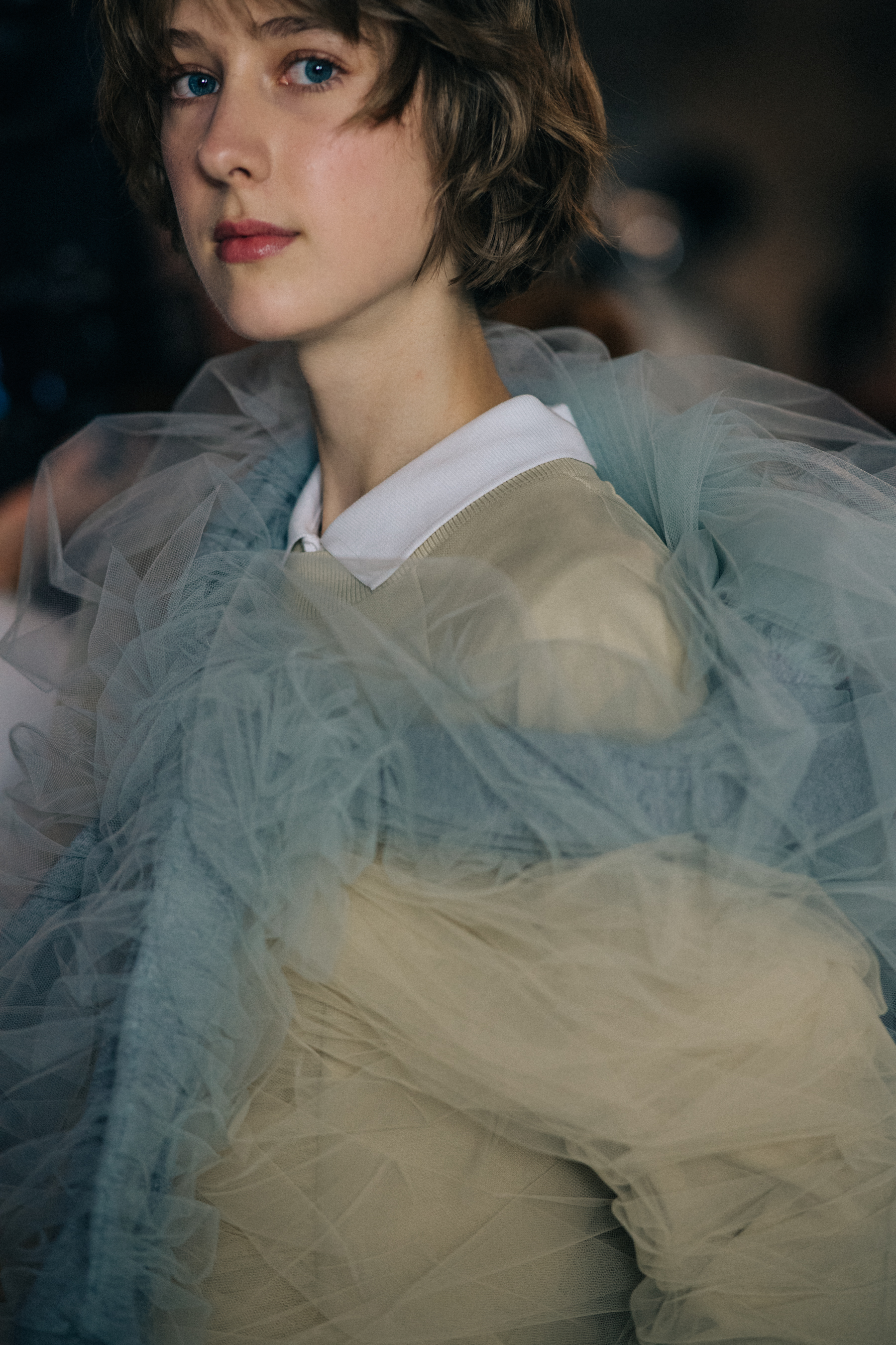 Model wearing ruffled dress