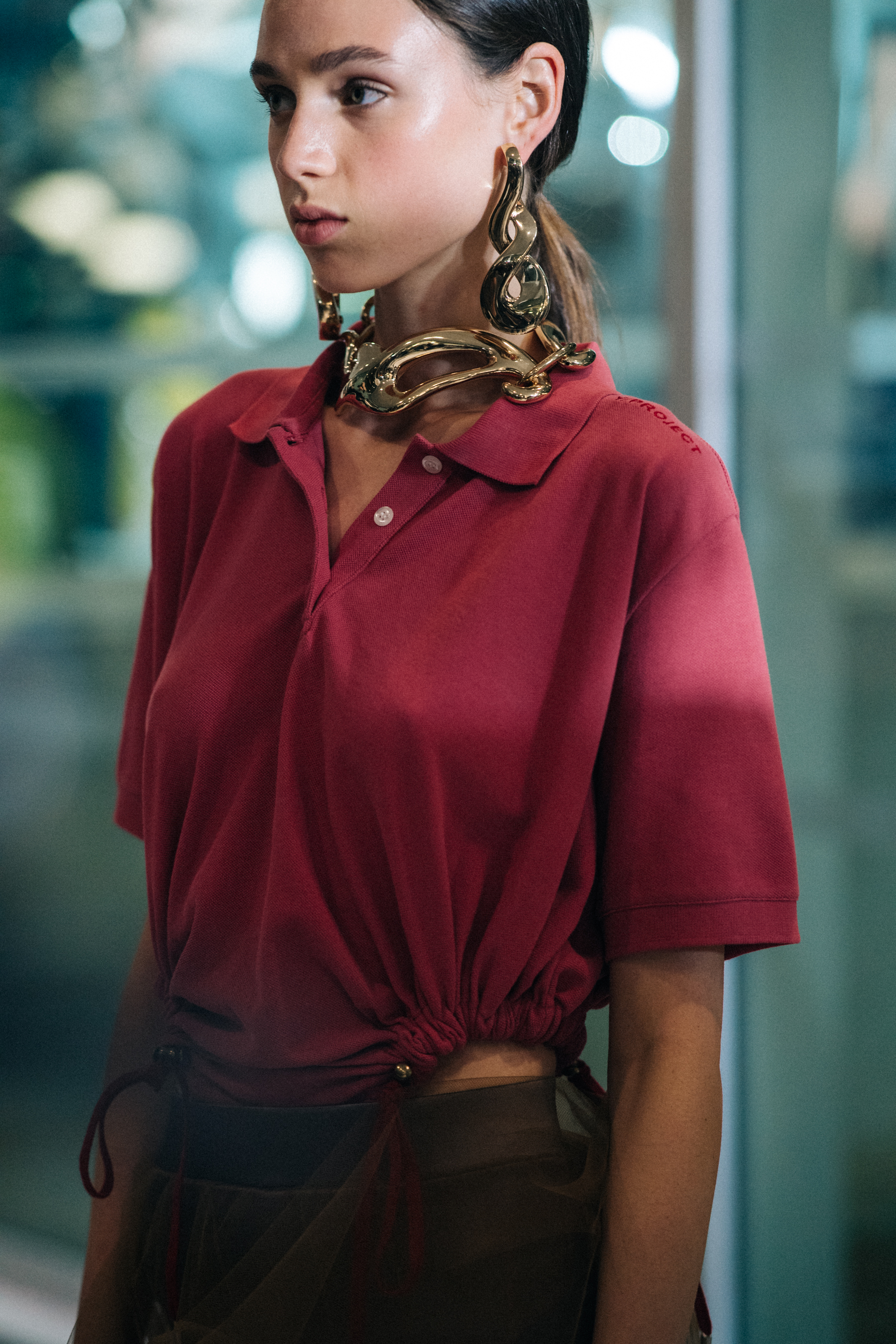 Model wearing red outfit