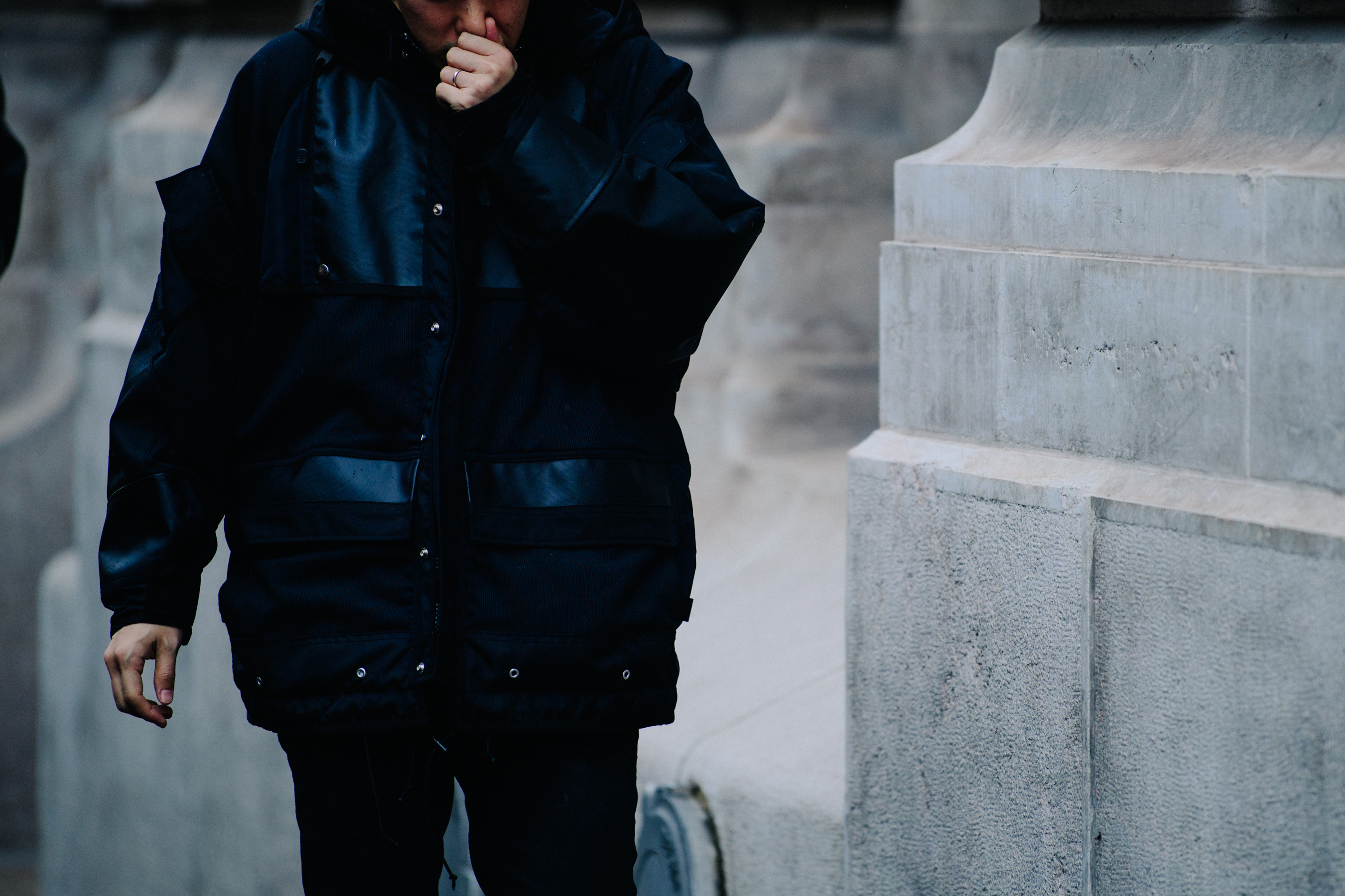 Man wearing black coat