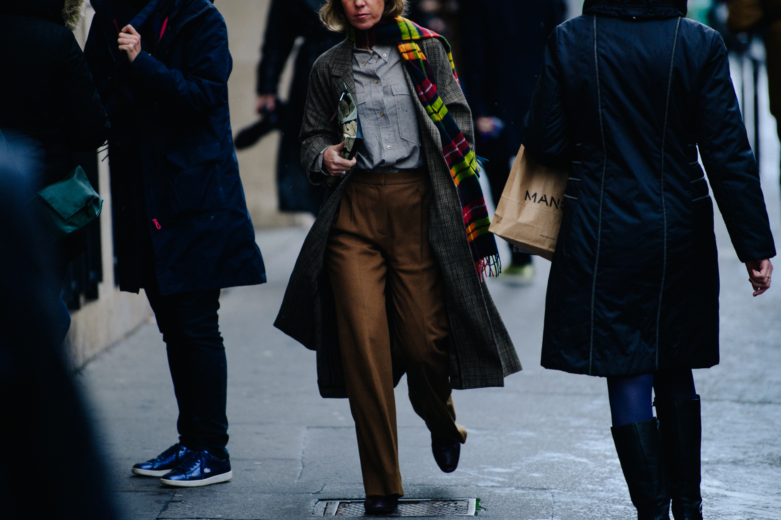Woman wearing wide brown trousers