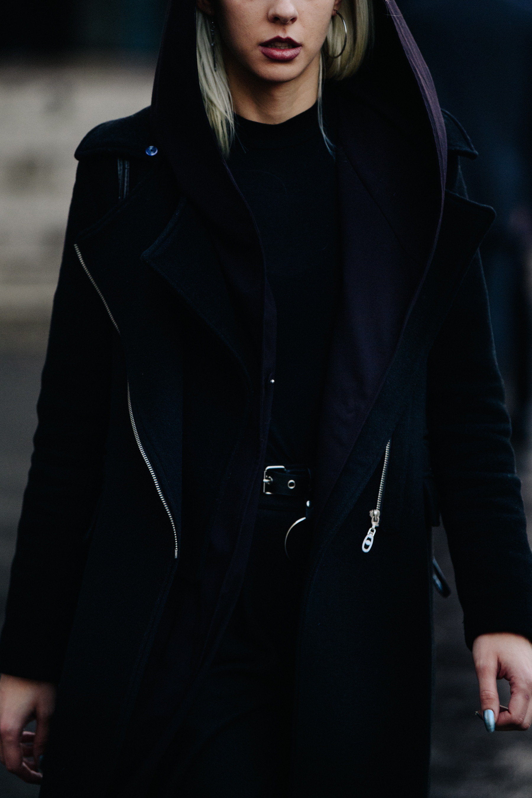 Woman wearing dark purple hoodie