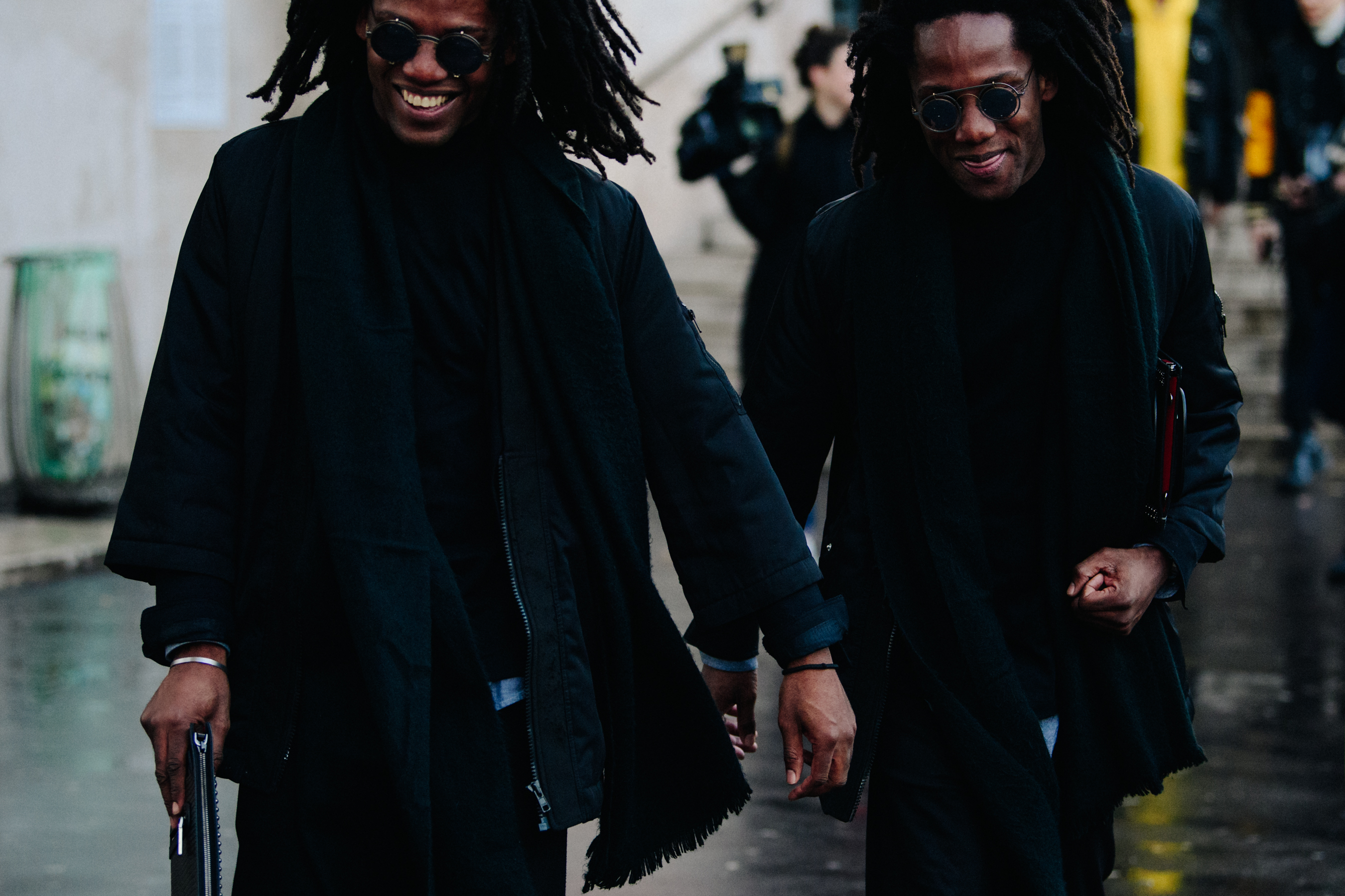 Twins with matching glasses