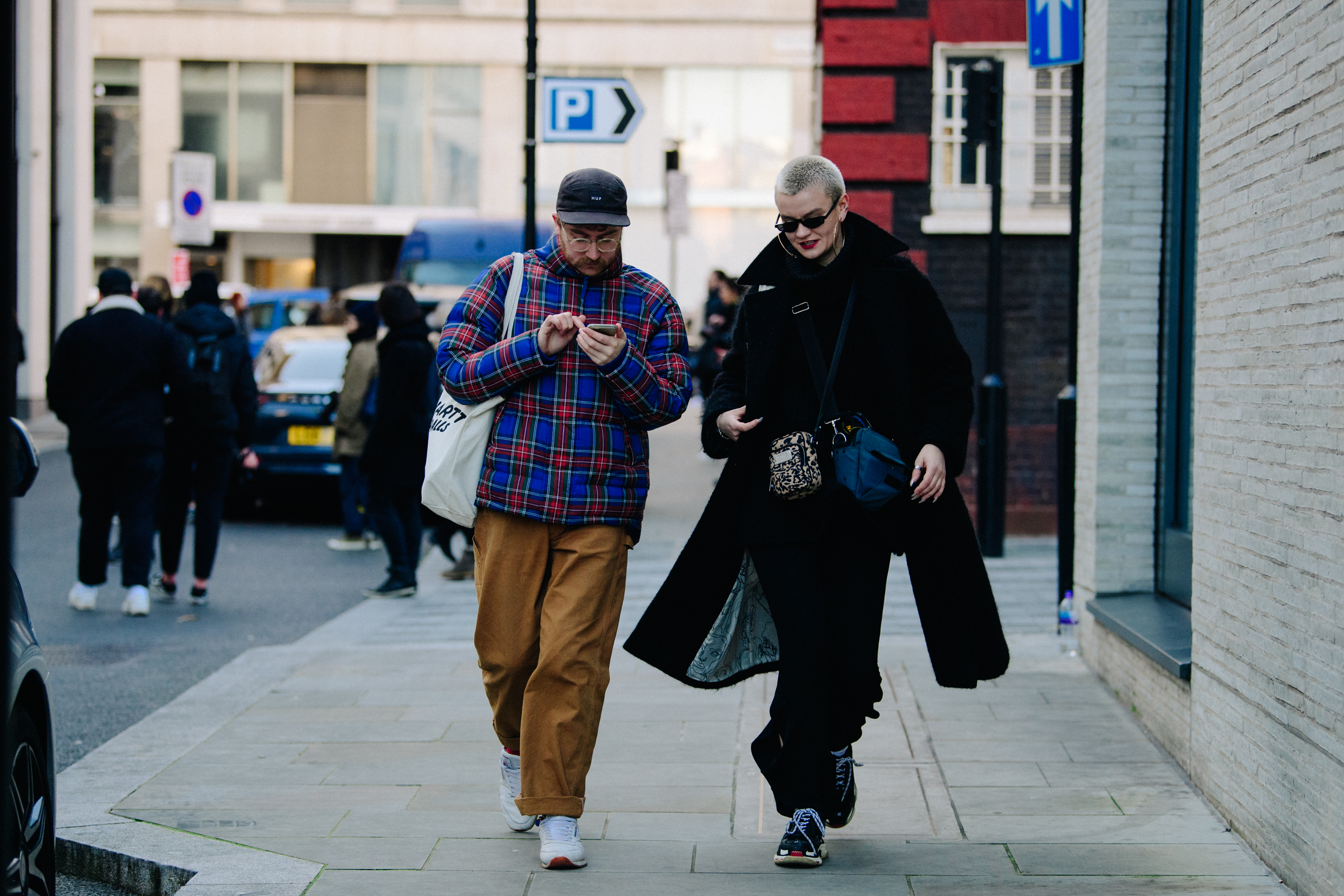 Couple walking with bags