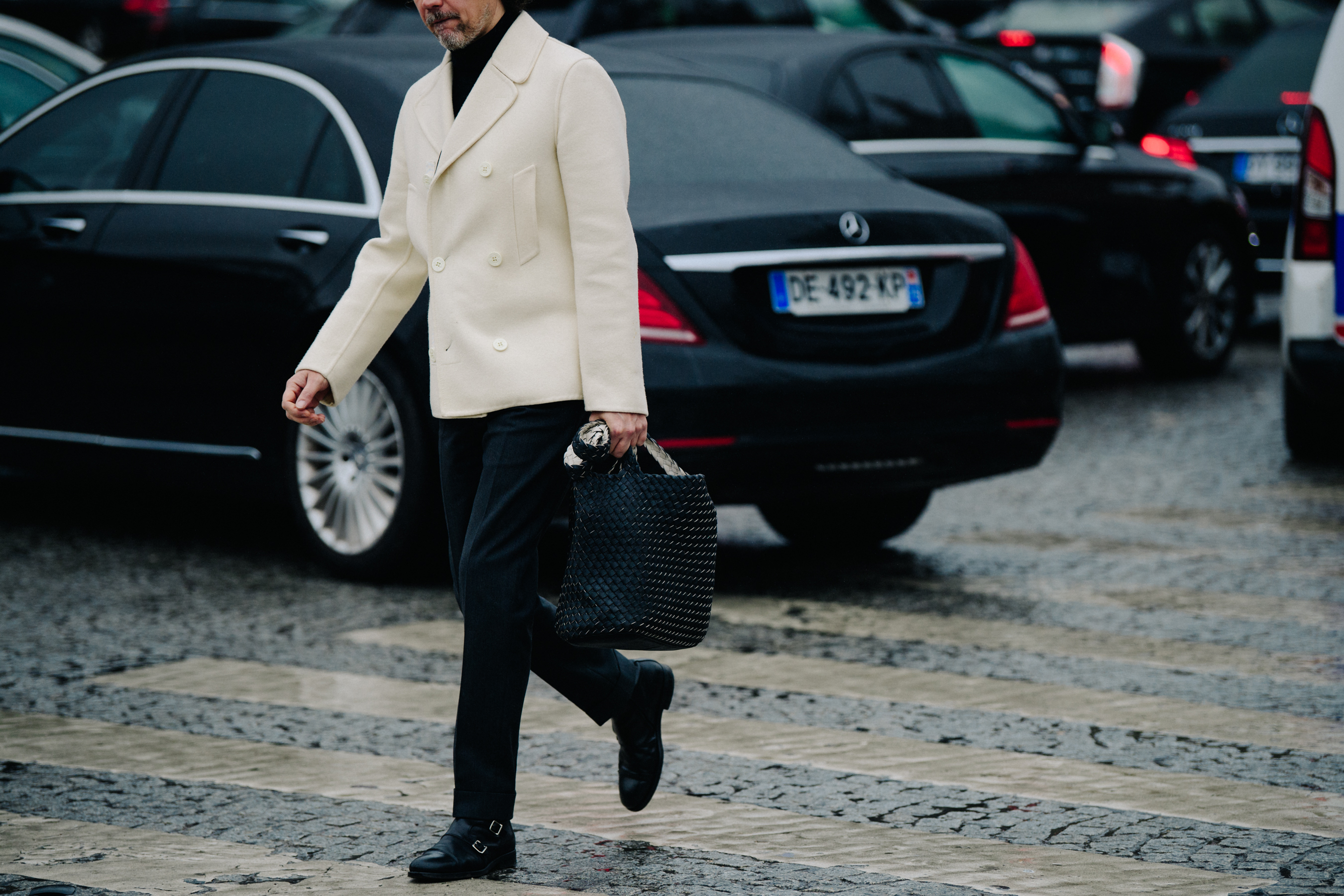 Man wearing white wool coat