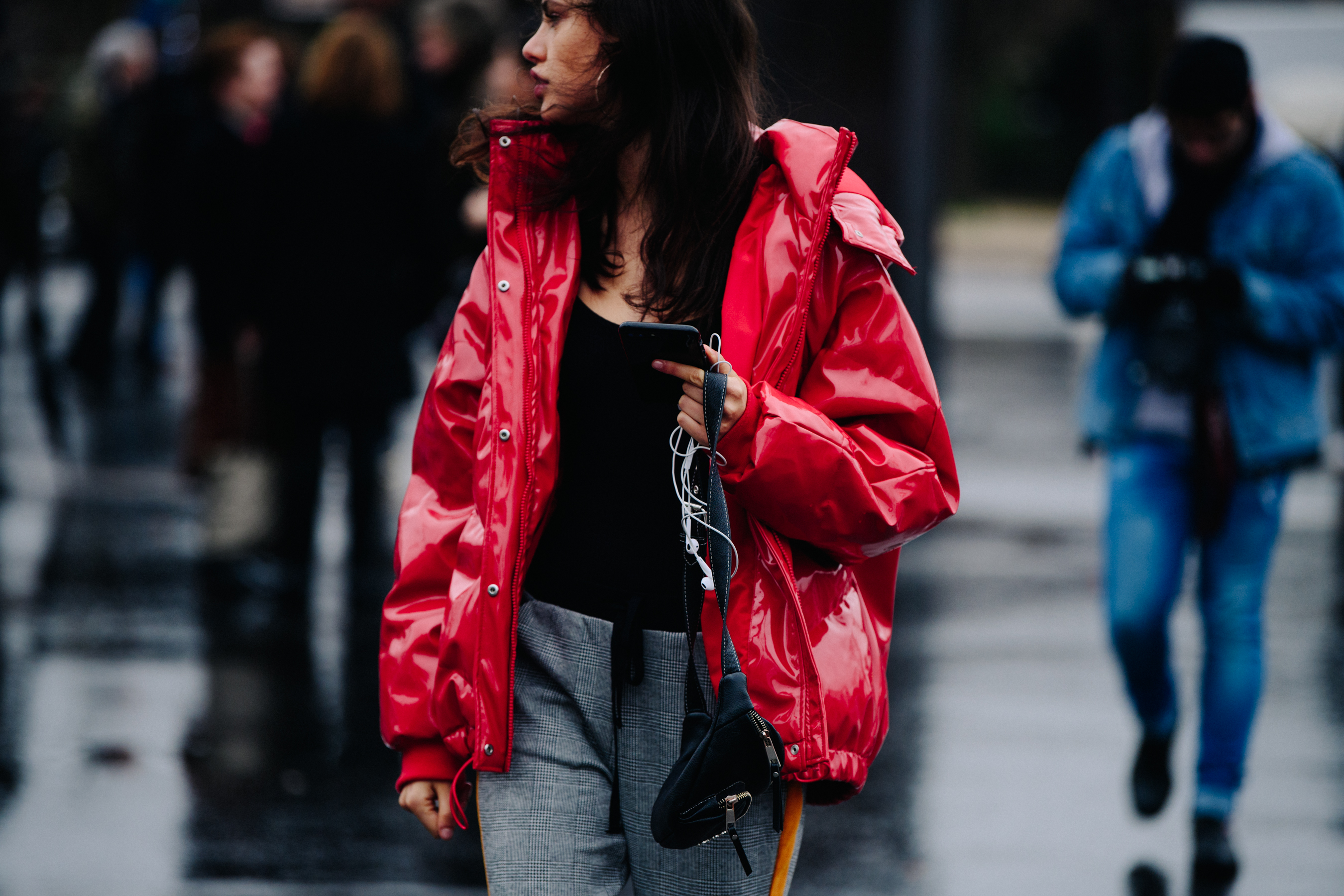 Model wearing red plastic jacket