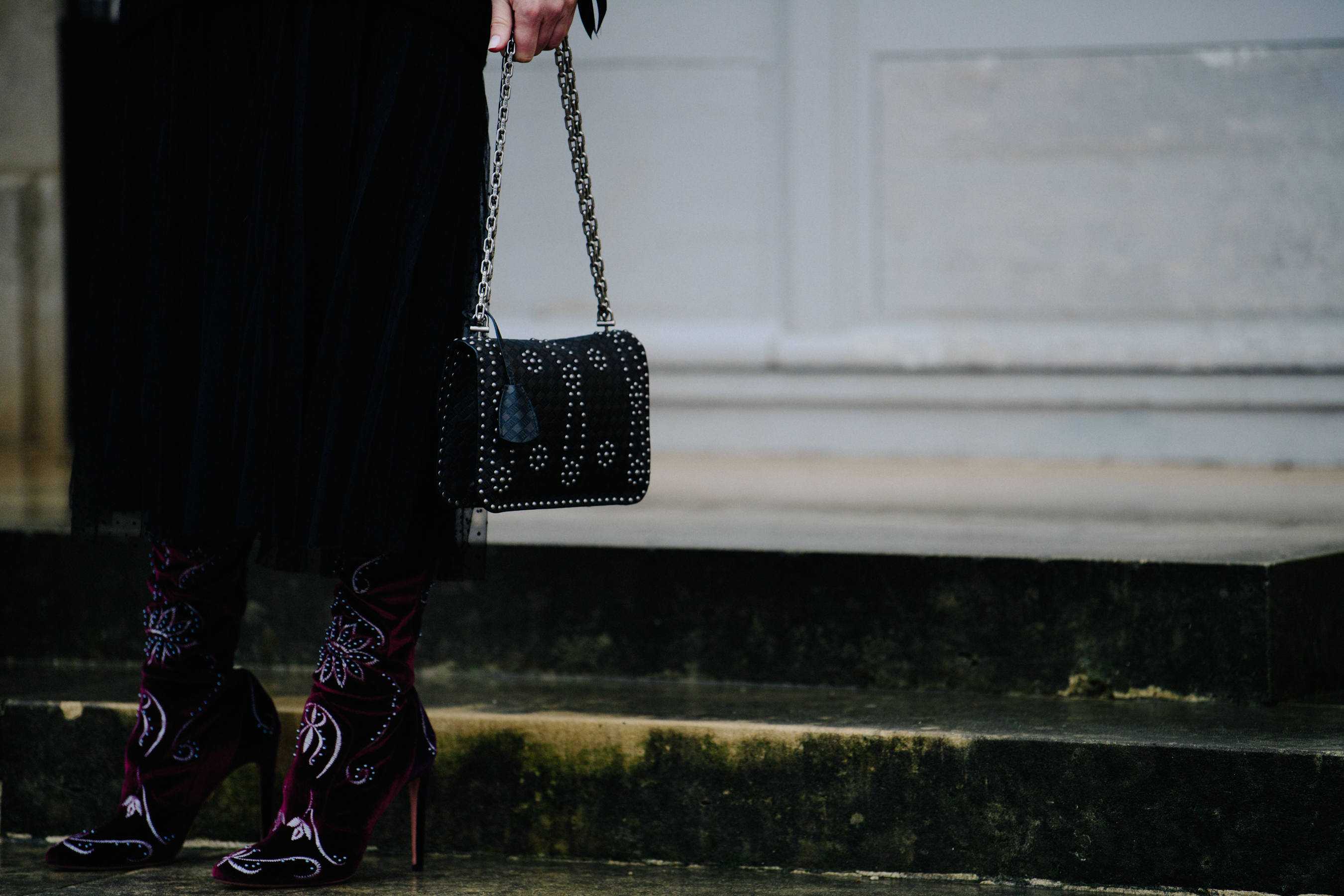 Woman carrying Christian Dior bag