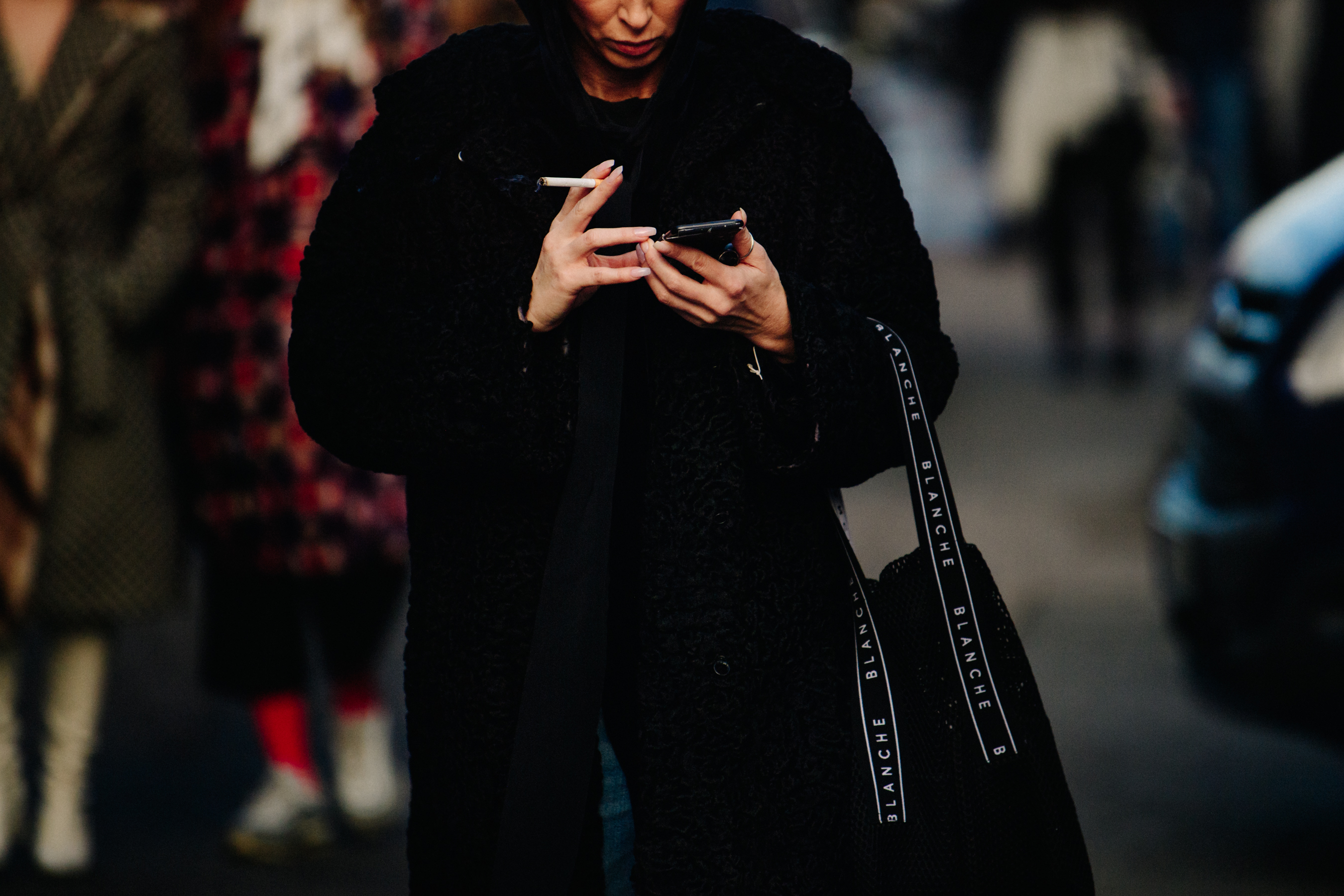 Woman wearing black coat