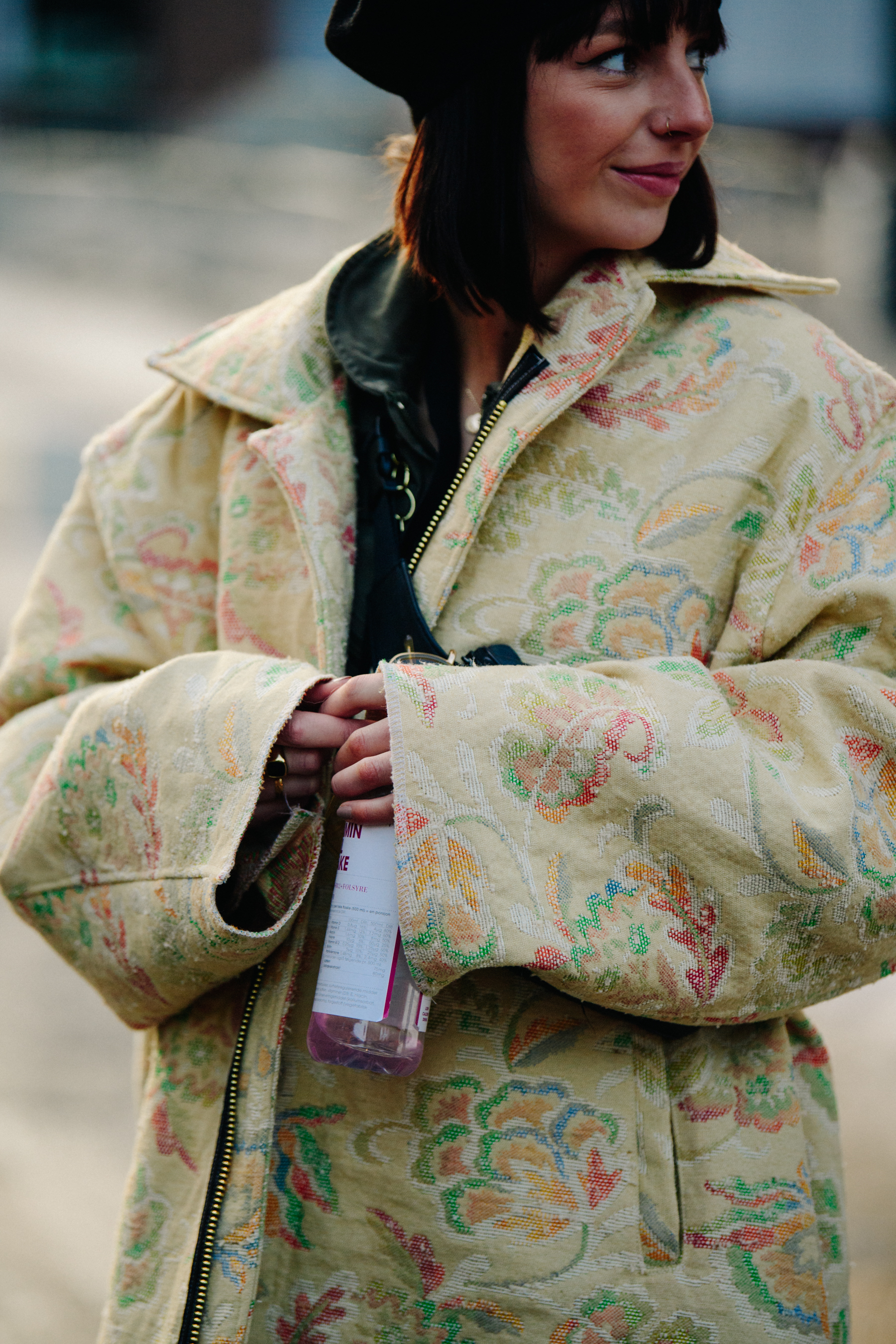 Woman wearing floral print coat