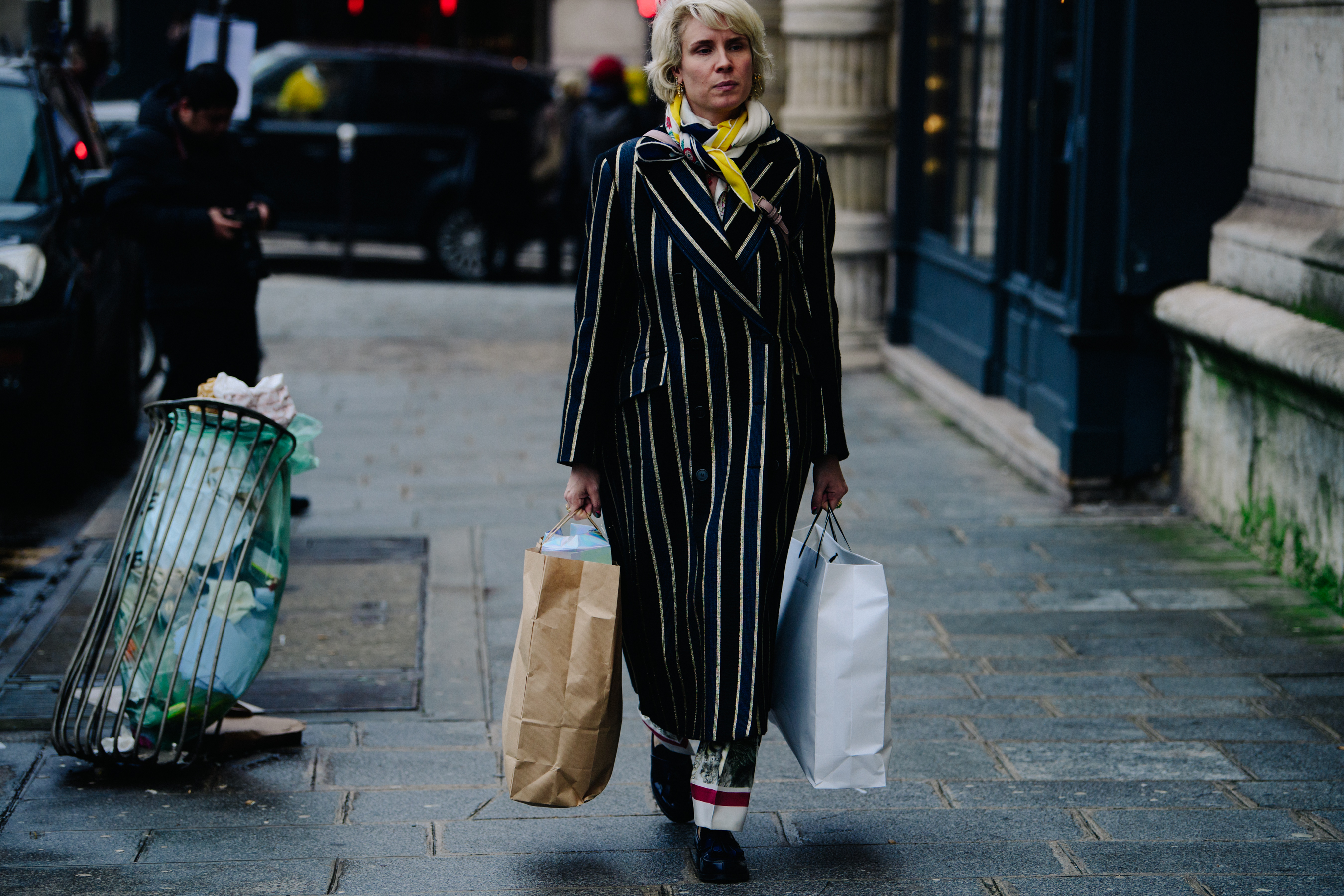 Woman carrying full shopping bags