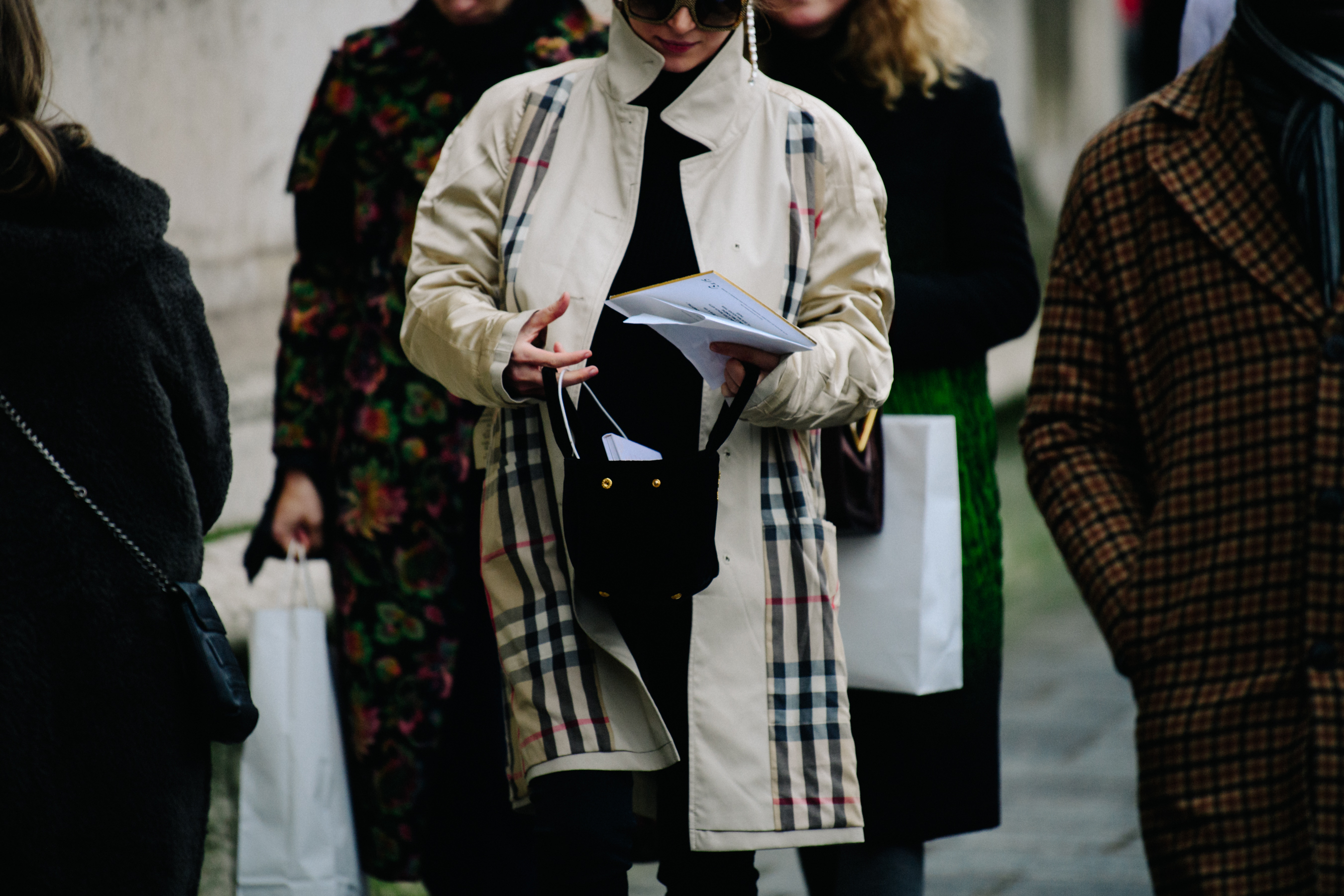 Woman wearing Burberry jacket