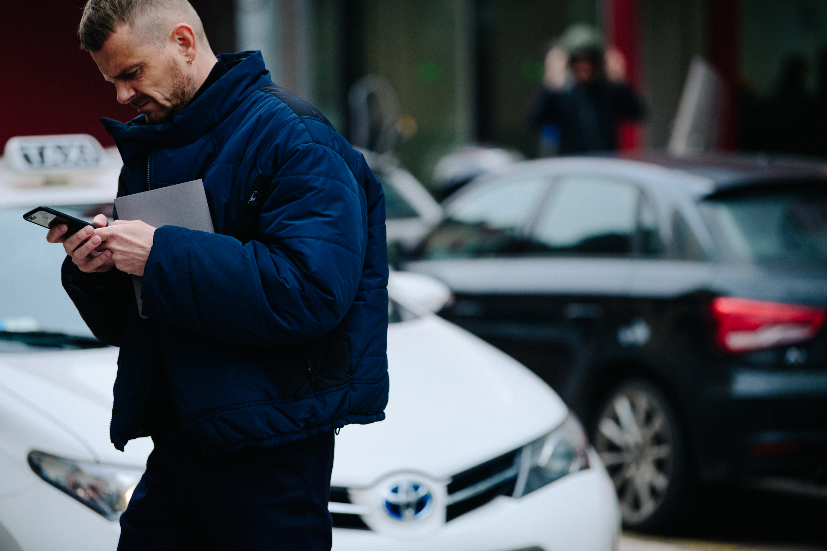 Man wearing blue winter coat