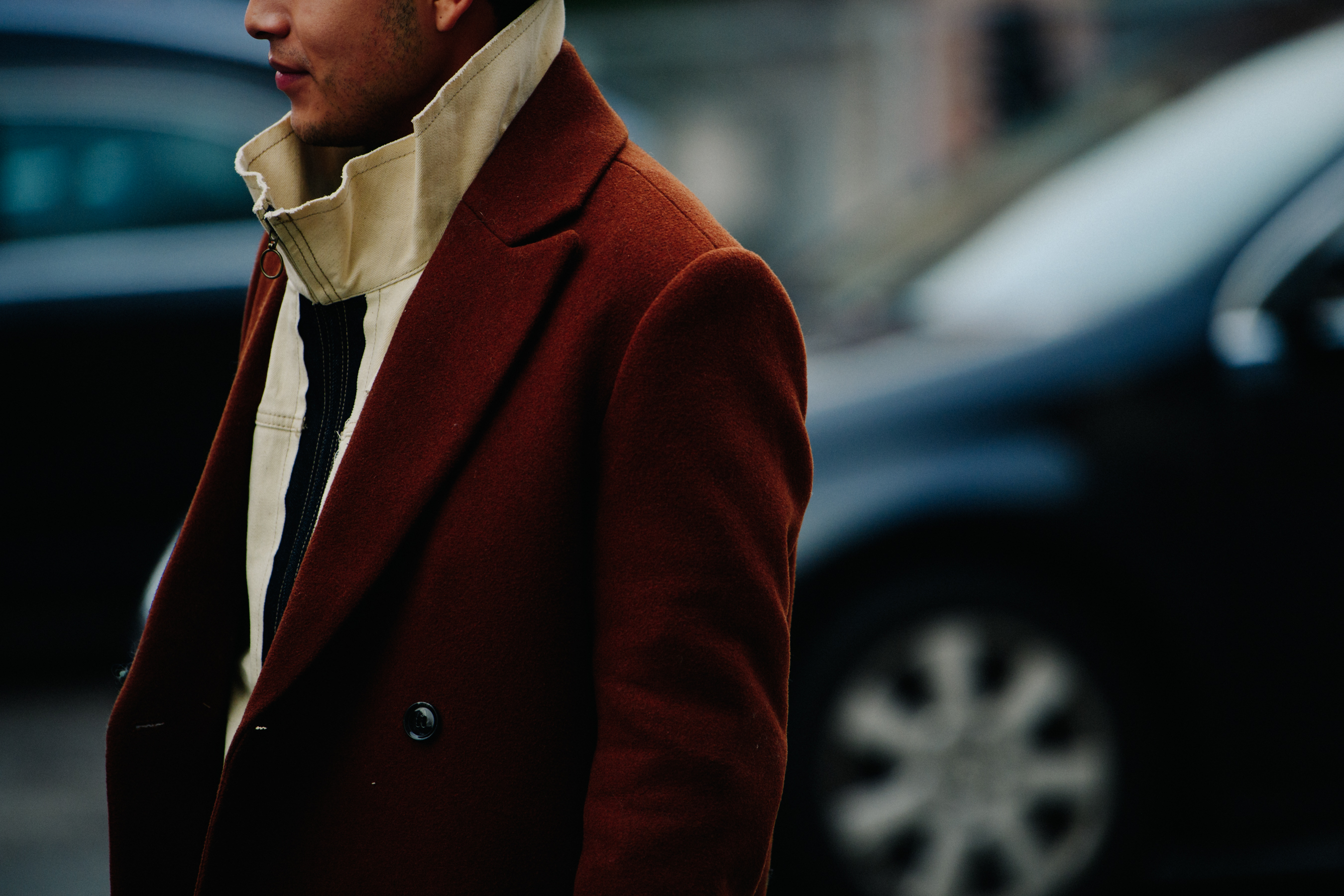 Man wearing brown smart coat