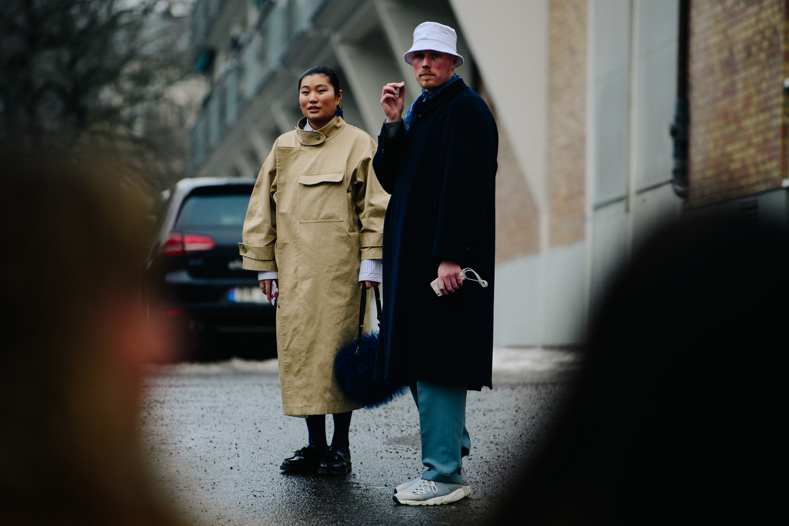 Danish couple wearing long coats