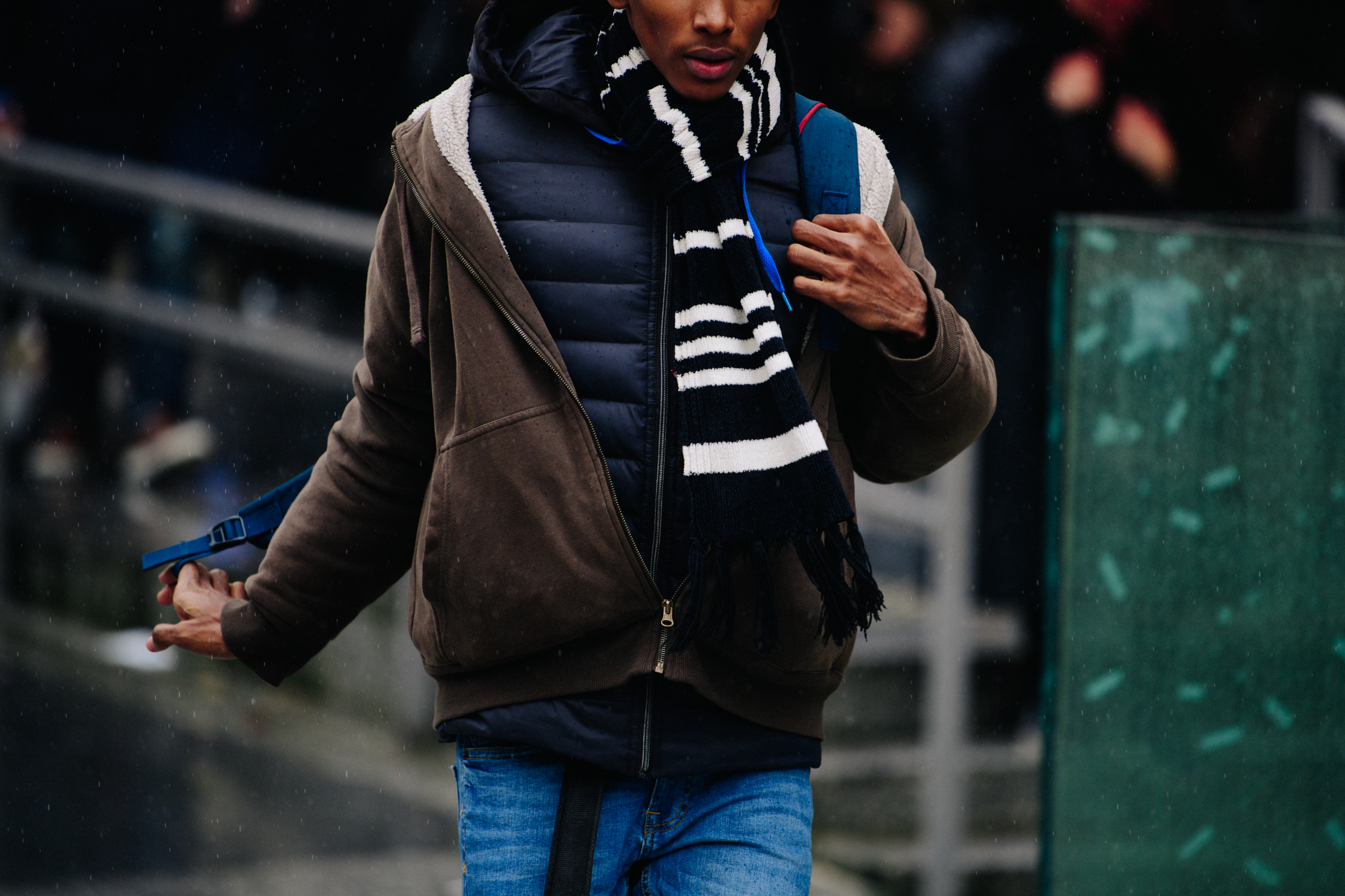Man wearing brown jacket