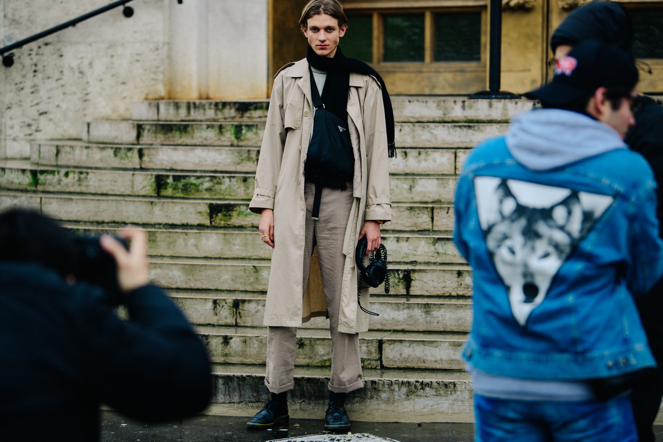 Model wearing pale trench coat