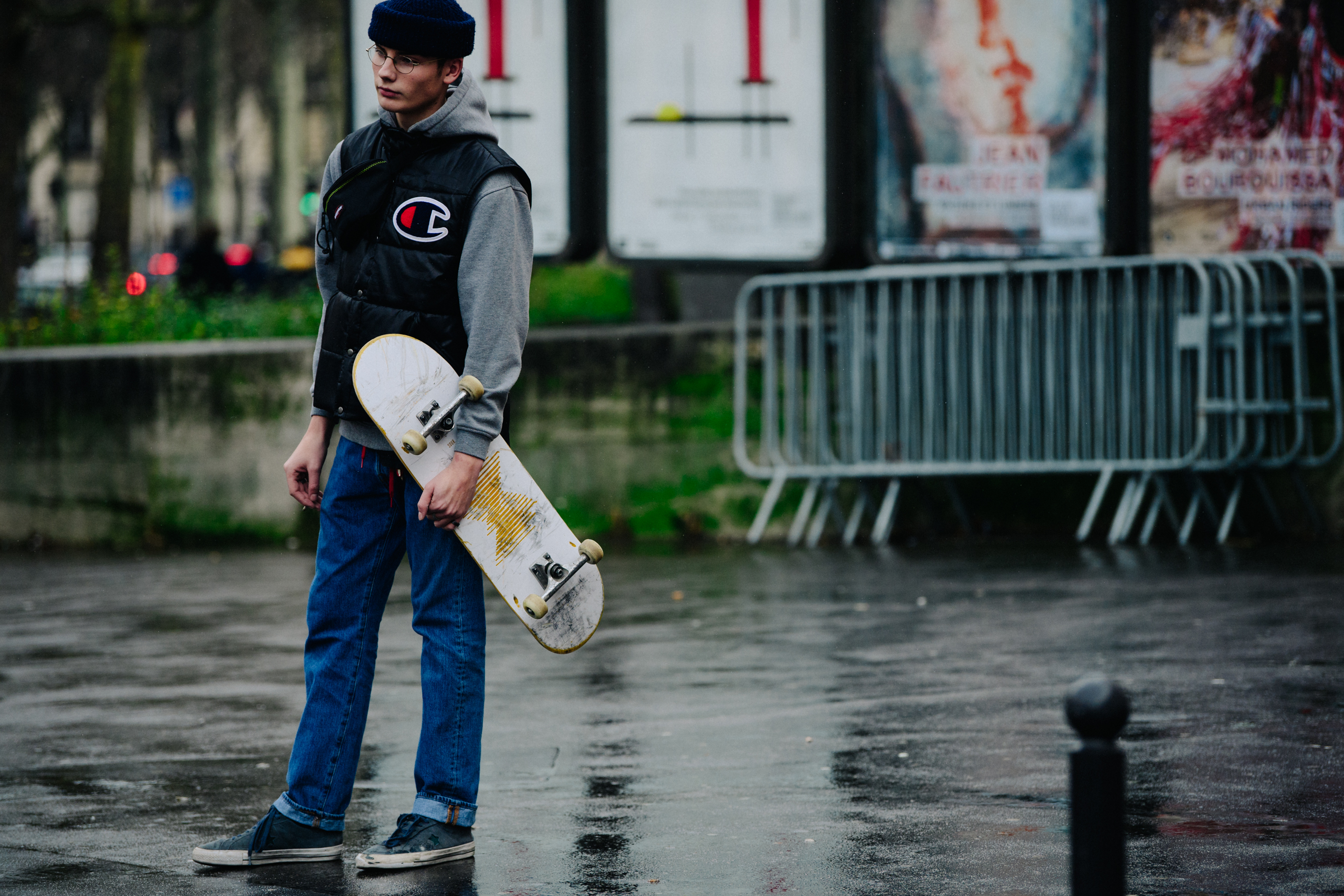 Model holding skateboard after Lanvin