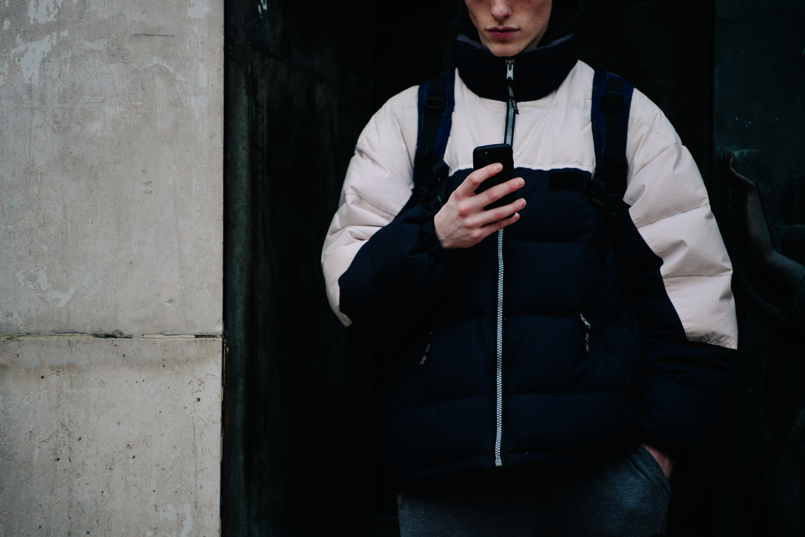 Model wearing black and white puffer jacket