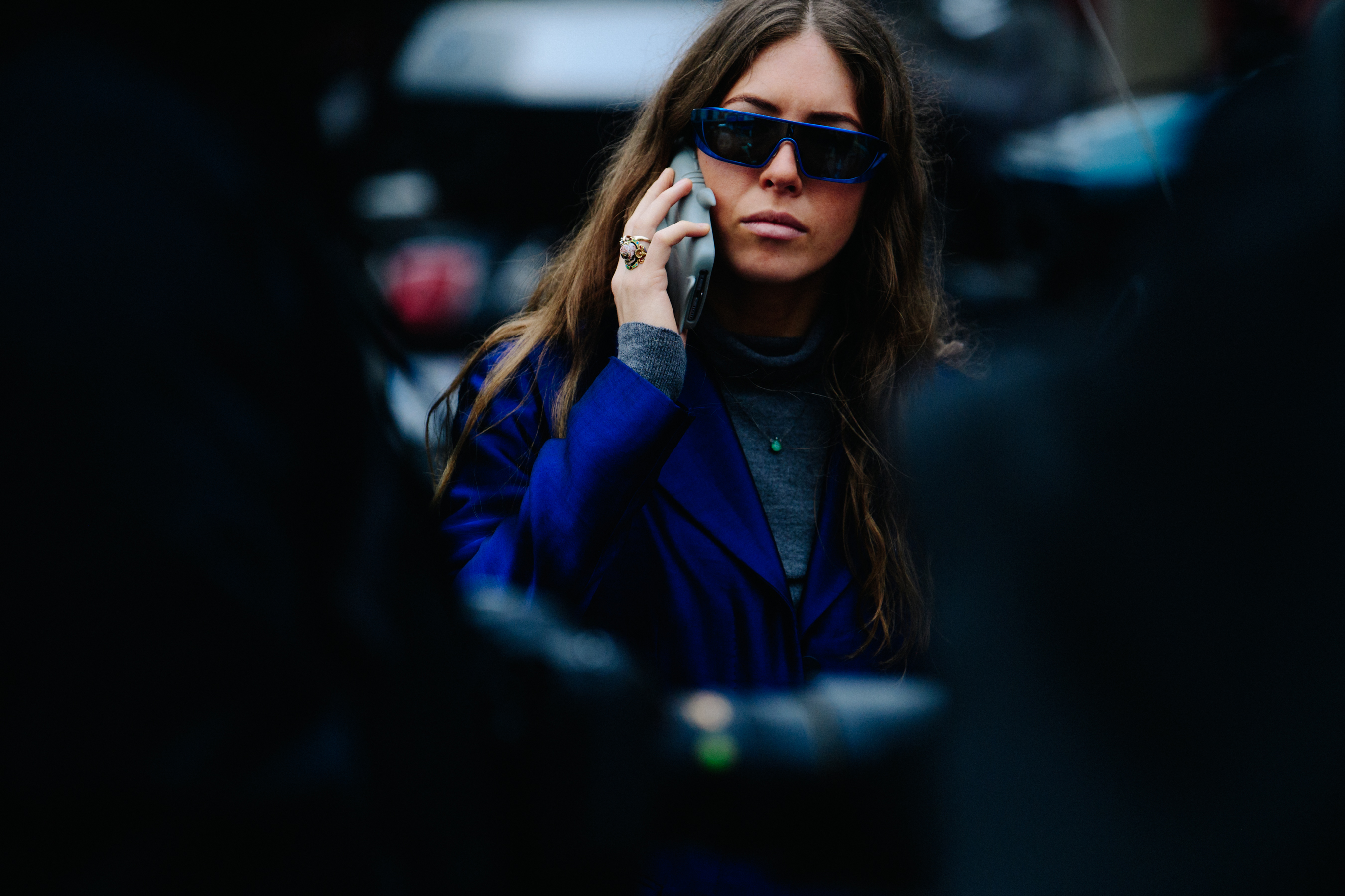 Woman wearing blue sunglasses