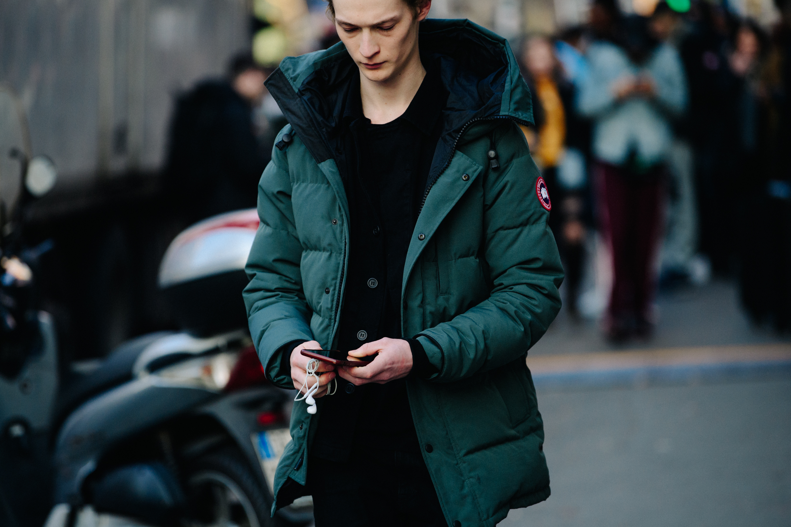 Model wearing green Canada Goose jacket