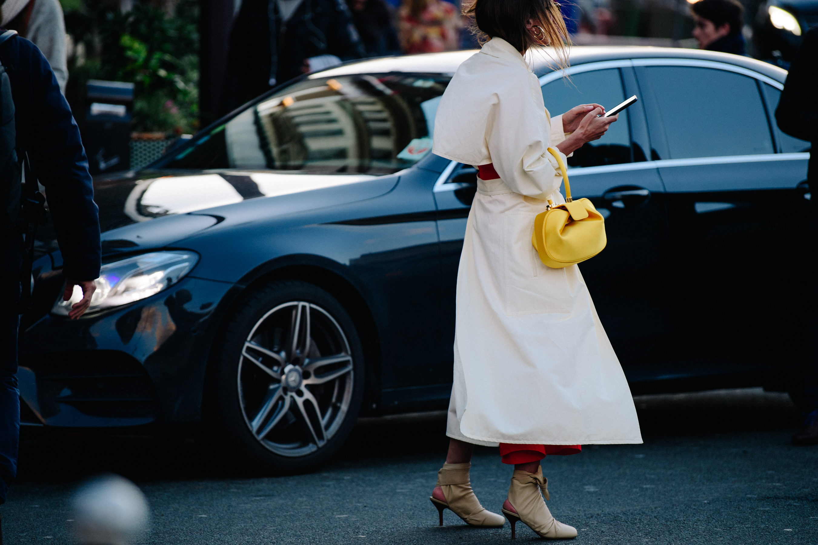 Woman wearing white coat