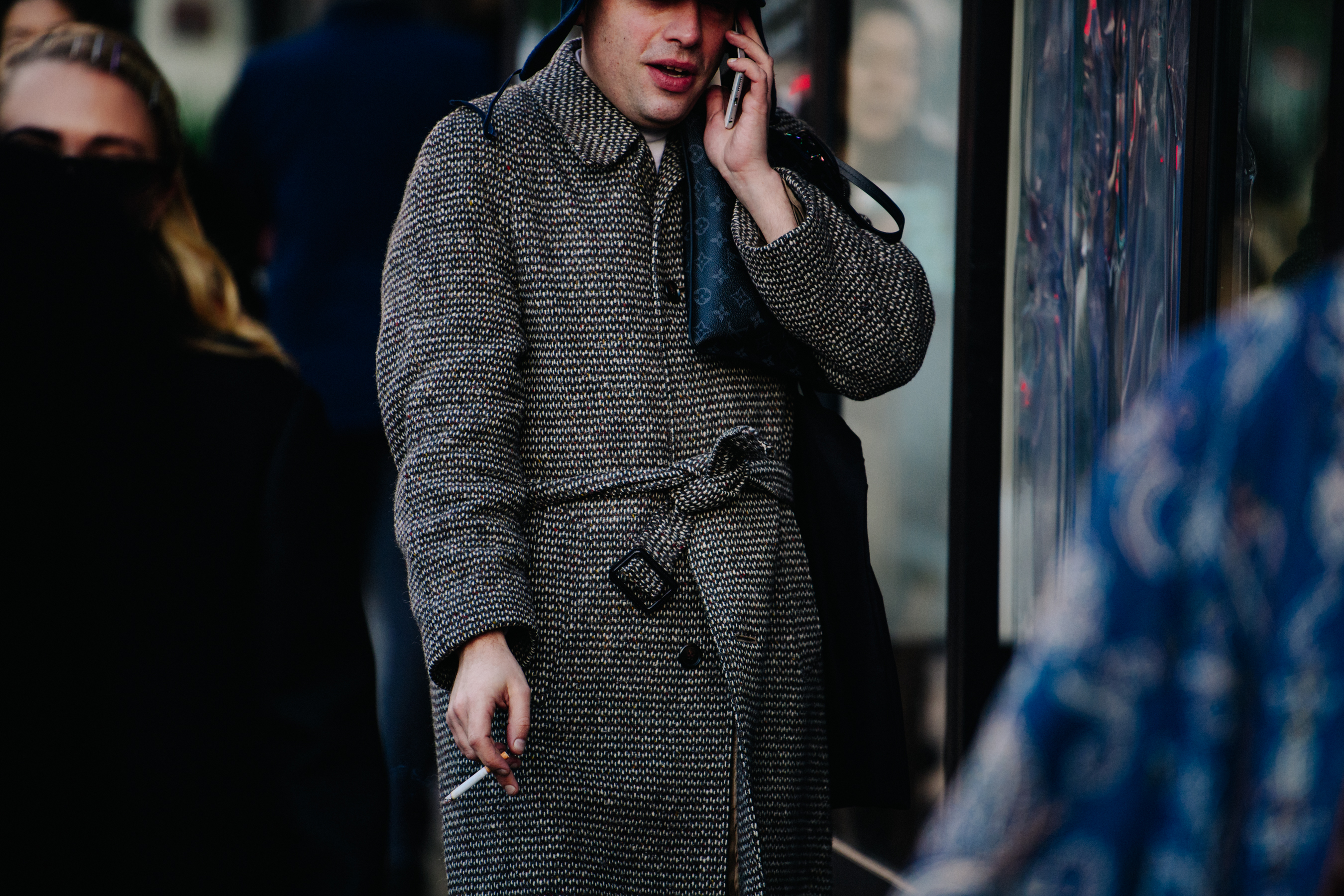 Man holding Louis Vuitton bag