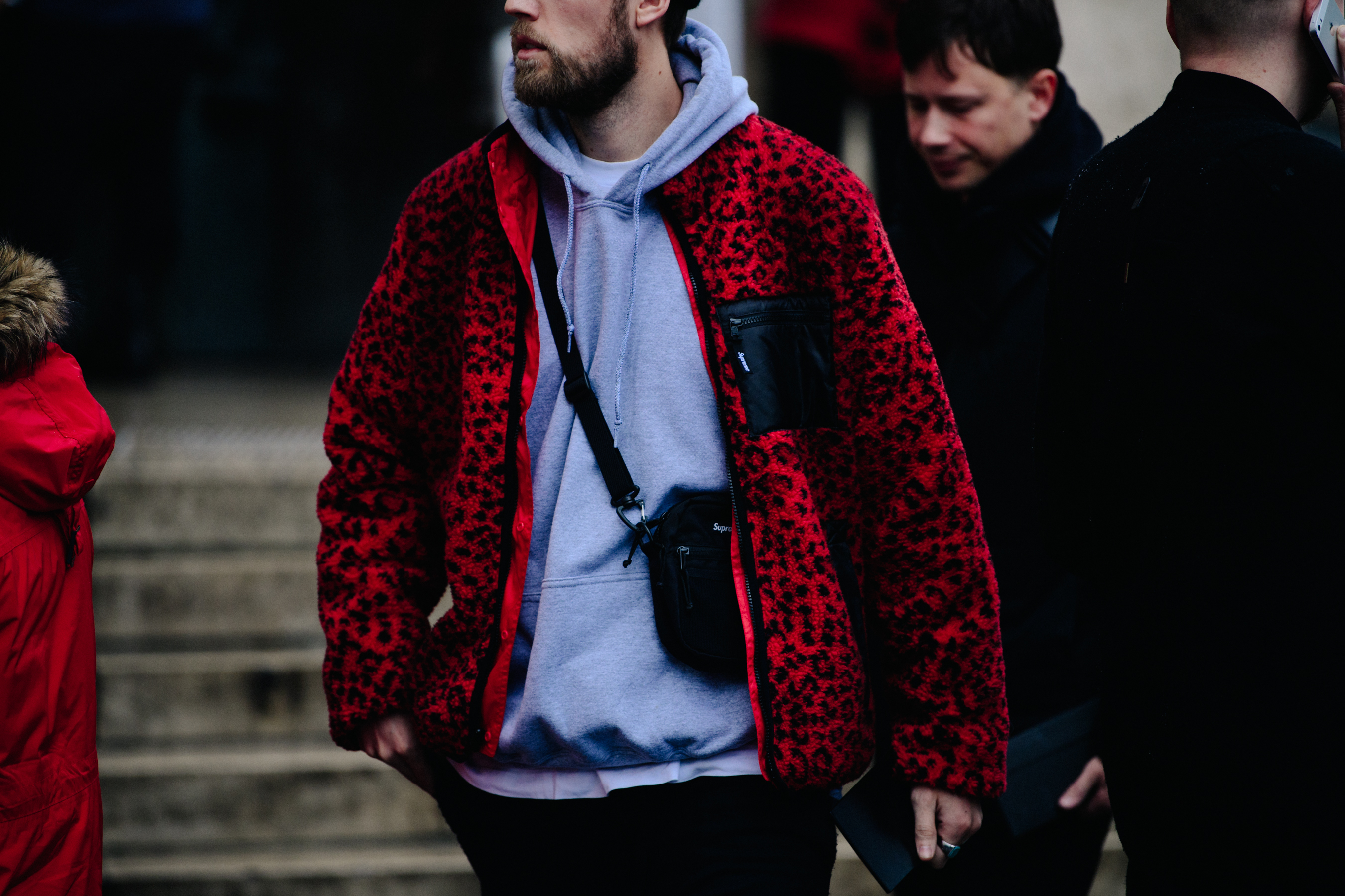 Man wearing red animal print jacket